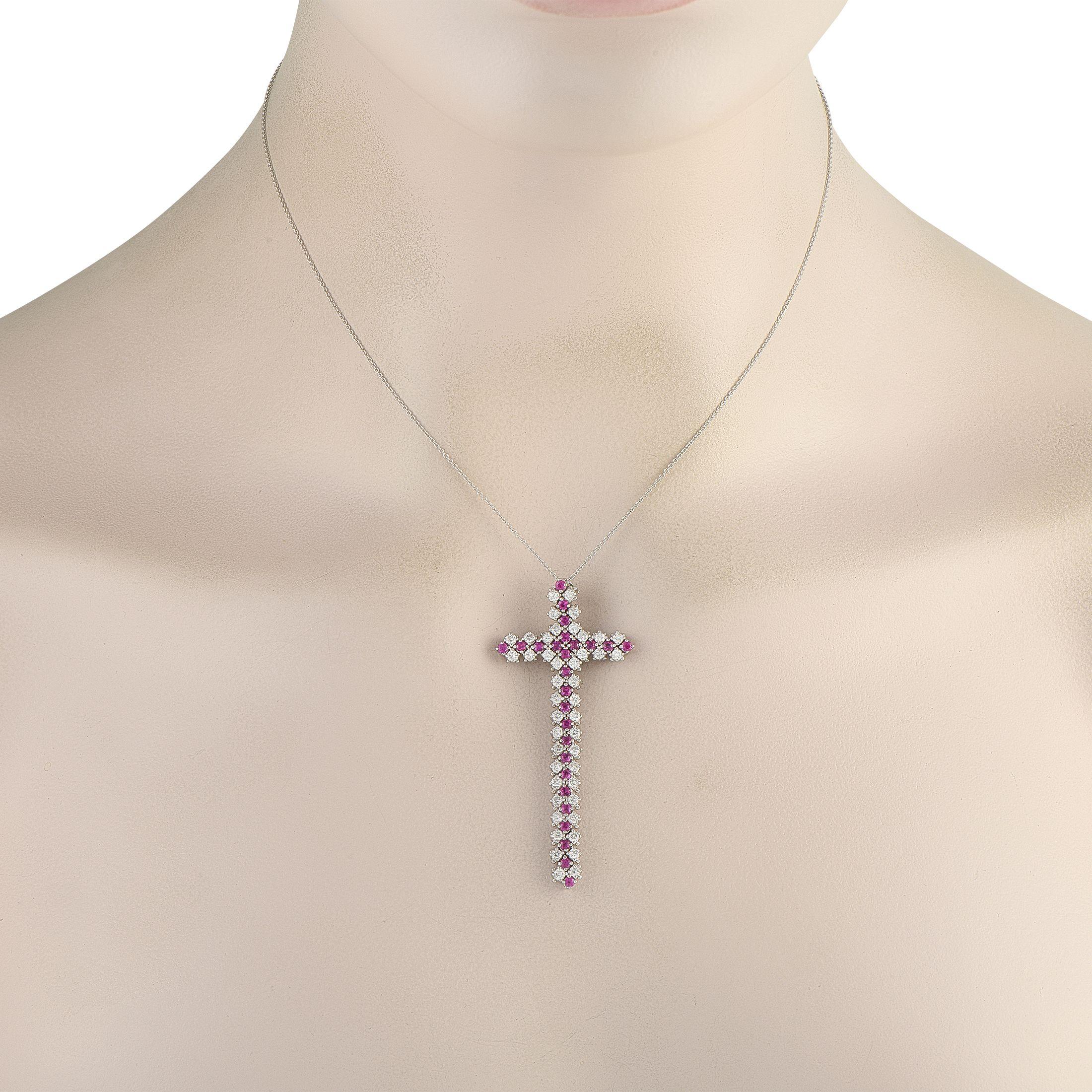 This breathtaking necklace offers a luxurious way to show your faith. Set in 18K White Gold, the cross pendant comes to life thanks to Ruby gemstones totaling 1.28 carats and Diamond accents with a total weight of 0.75 carats. The pendant measures