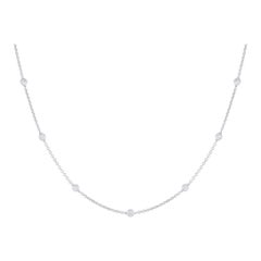 Collar de oro blanco de 18 quilates con estación de diamantes de 0,75 ct ANK-17469