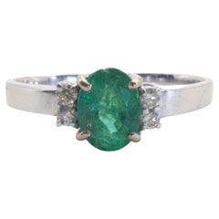18k White Gold 0.75ct Oval Emerald & 0.10ct Diamond Engagement Ring