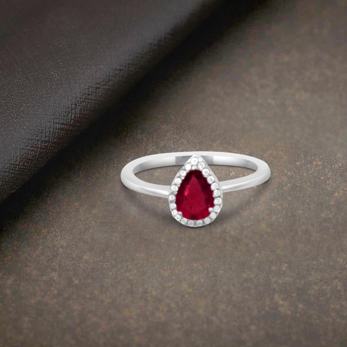 Solid 18K White Gold Pear Shaped Red Simulated Ruby And White Diamond Ring Or Fashion Band Prong Set Solitaire Shaped Halo Ring.
This Gorgeous Ring Features A Stunning 7x5mm Pear Shaped Ruby Gemstone Weighing A Total Of 0.75 Carats.
Whichever Way