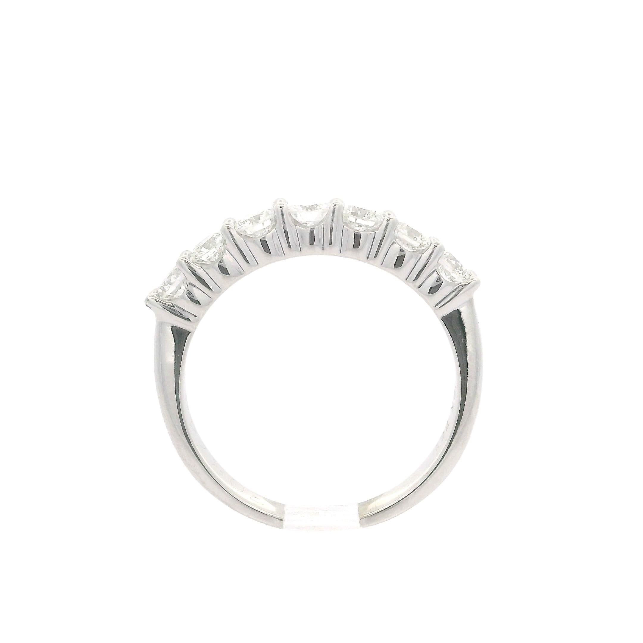 –Stone(s)–
(7) Natural Genuine Diamond - Round Brilliant Cut - Shared Prong Set - F/G Color  - VS1-SI1 Clarity - 0.75ctw (approx.)

Material: Solid 18k White Gold
Weight: 4.0 Grams
Ring Size: 6.5 (fitted on finger, please contact us prior to