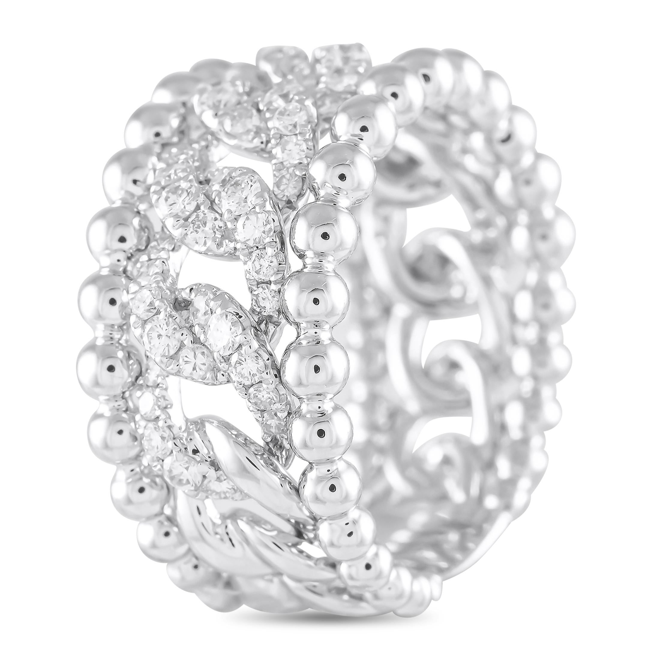 A sensational band, this ring offers a lot of detail. The wide, openwork band is fashioned from 18K white gold. Its edges feature white gold beads in polished finish, framing a curb-style chain pattern embellished with pave-set diamonds. The ring's
