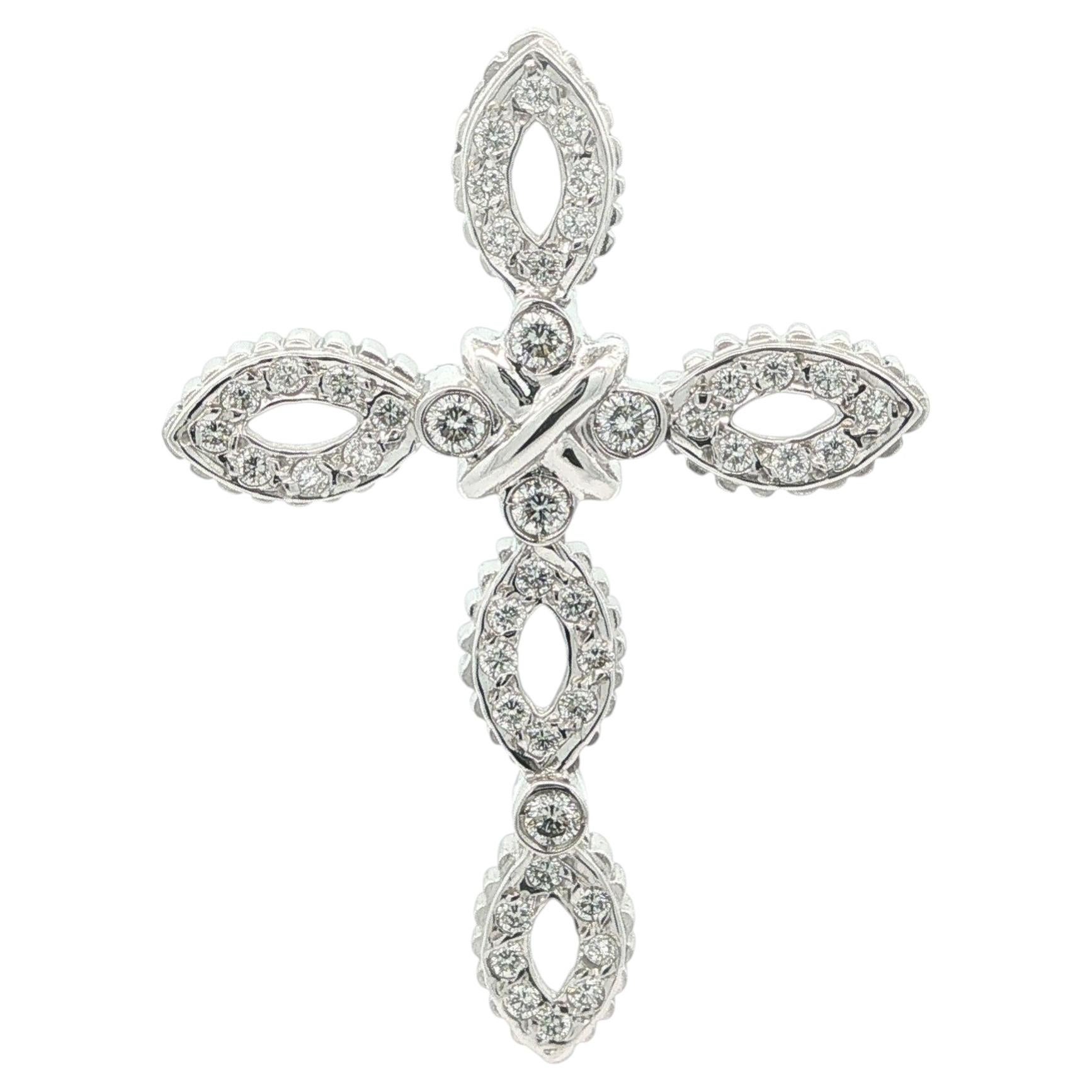 Ciondolo a forma di grande croce scorrevole in oro bianco 18k con diamanti incastonati a pavé e a castone per un totale di 0,80 ct