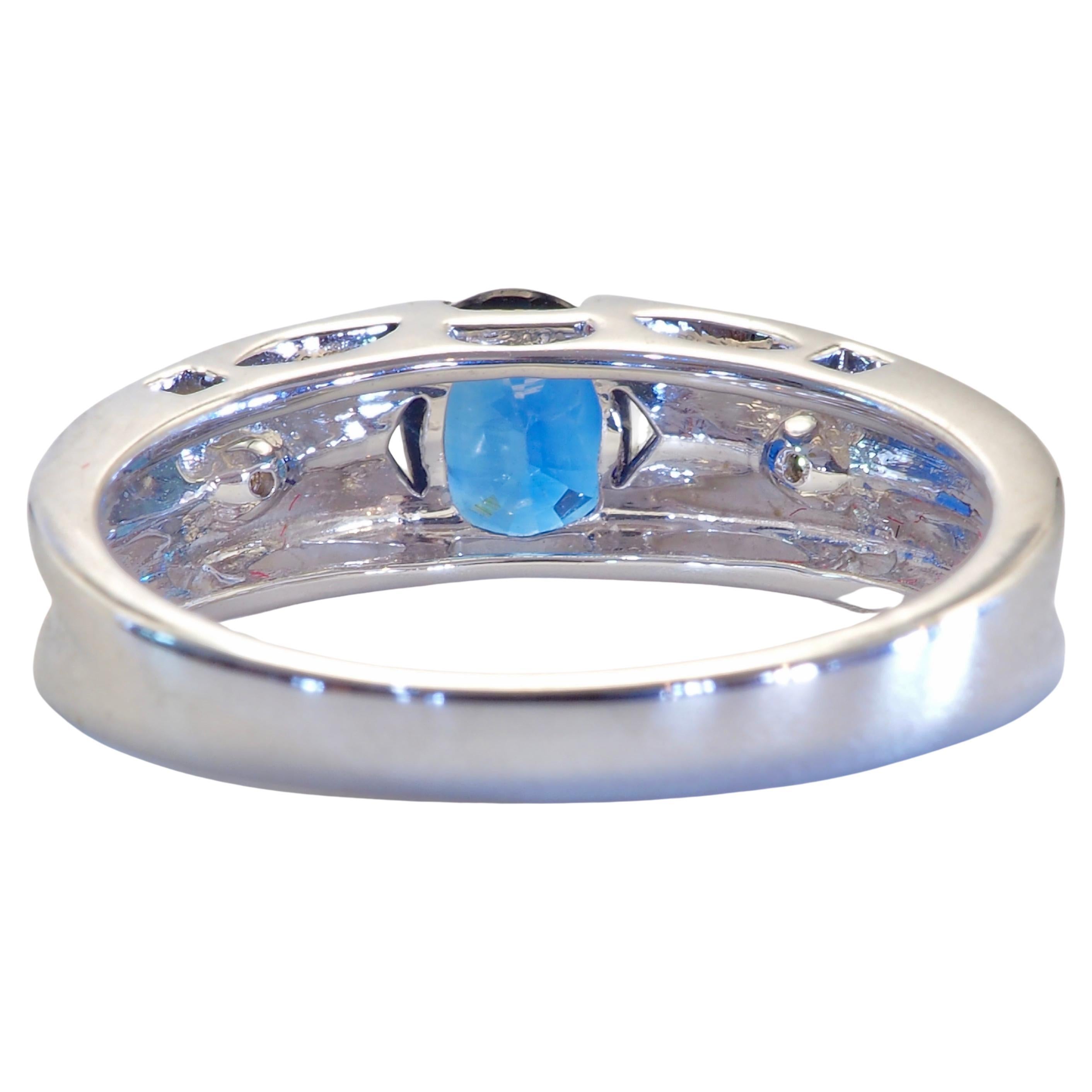 Modern unique design matte band ring with wide band equipped with oval Thai blue sapphire and 2 good grade diamonds on the side. Intricate craftsmanship of international level can be seen on this ring.

Product Details:

Metal: 18k Solid Gold
Metal