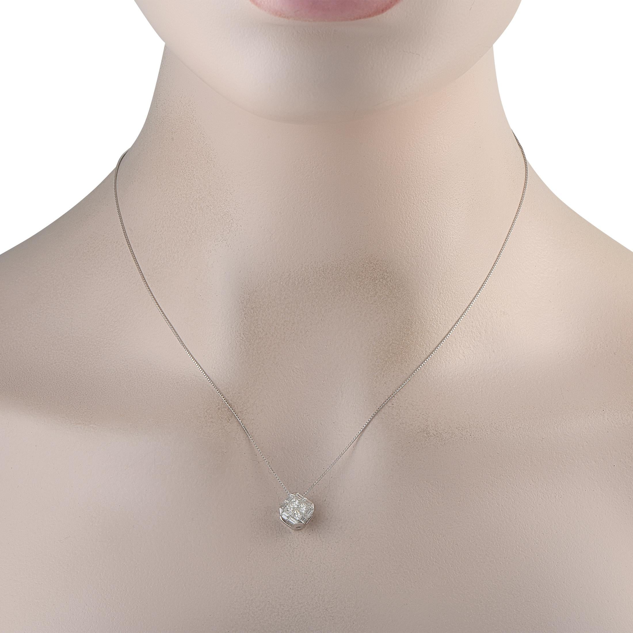 This necklace is an elegant, understated piece that is ideal for everyday wear. The stylish 18K White Gold pendant radiates light thanks to a geometric arrangement of Diamonds totaling 0.85 carats. The pendant measures 0.40 round and is suspended