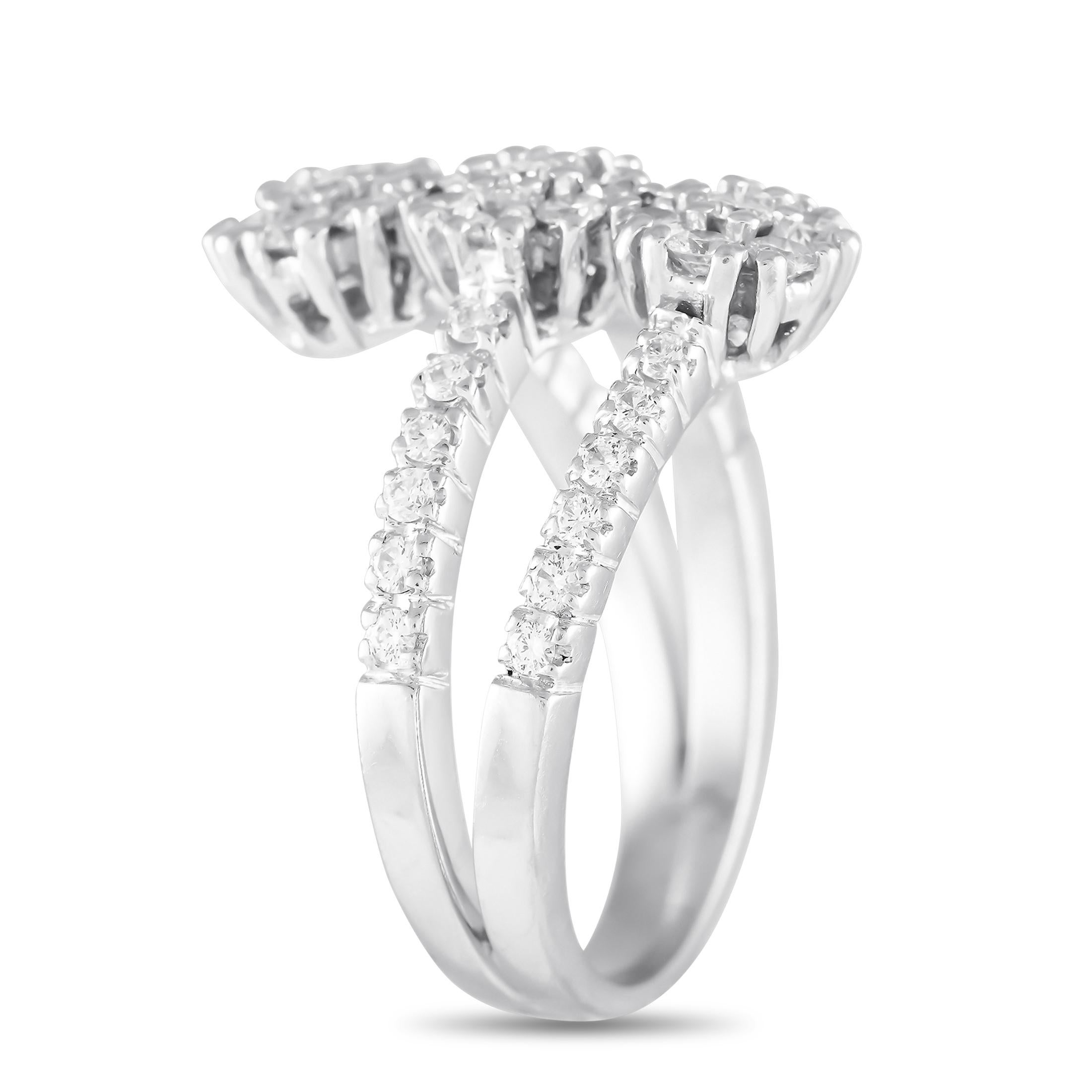 Love the stacked look but prefer to wear just one ring? Then this elegant and unique piece is for you. This 18K white gold ring has a split shank that creates a coiled, multi-ring silhouette. The ring is composed of a perfect circle middle band with