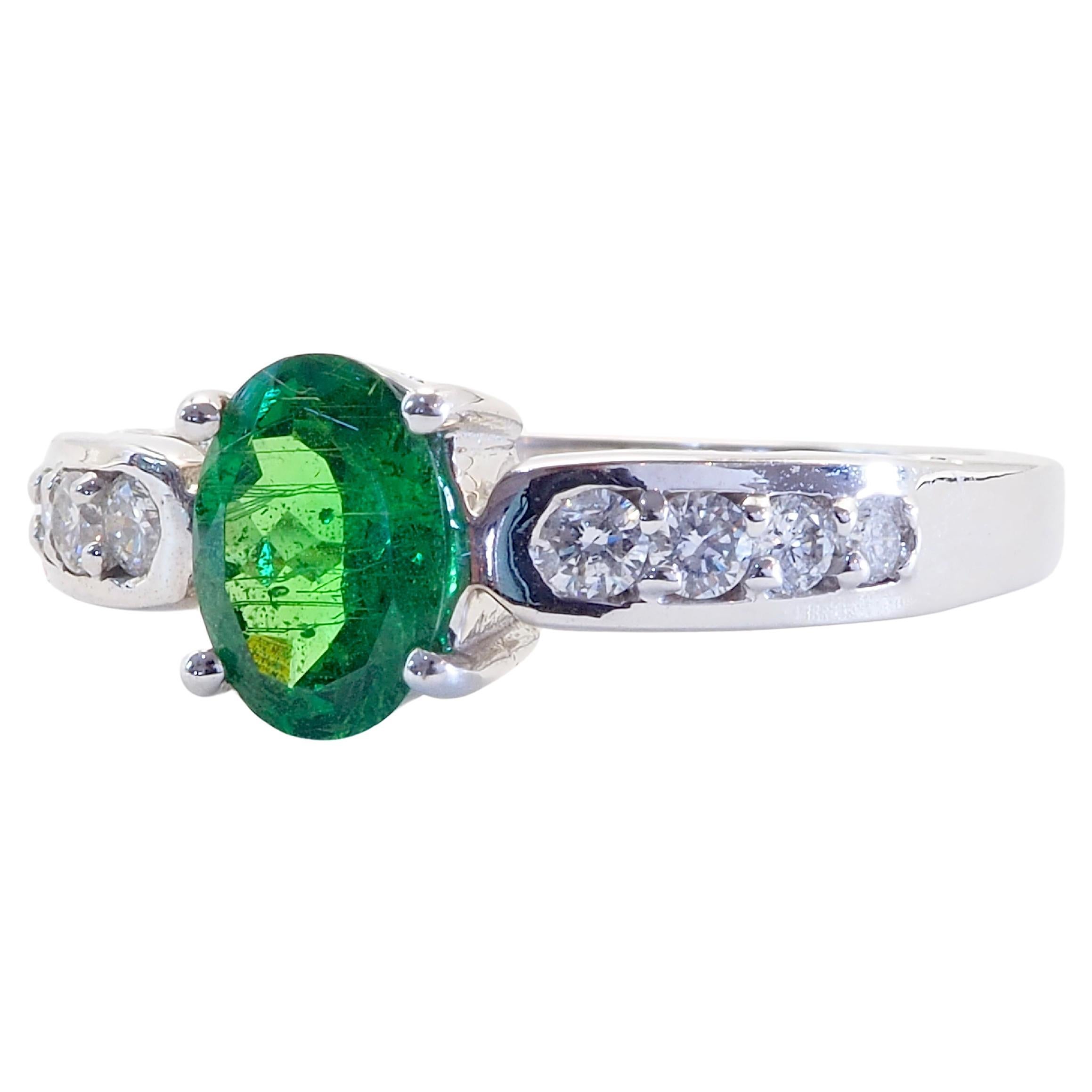Sophisticated engagement ring for super special occasions. For those who loves rare green garnets.

Product Details:

Metal: 18k Solid Gold
Metal Color: White Gold
Gold weight: 4 grams
Tsavorite Garnet: Natural, green, oval cut, 0.88 carats. 7.5x5.4