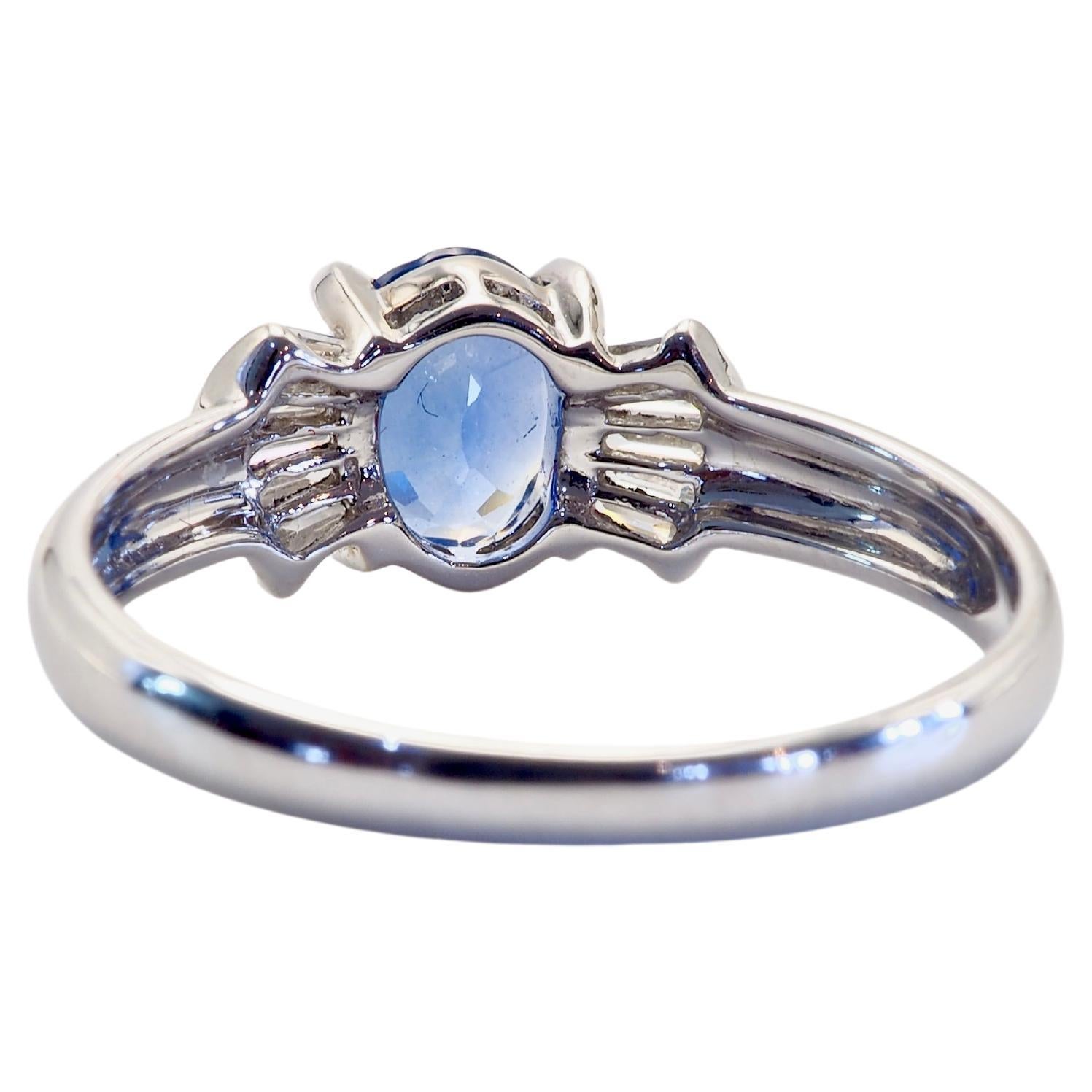 Oval Cut 18K White Gold 0.90ct Cornflower Blue Sapphire & 0.20ct Diamond Bow Ring