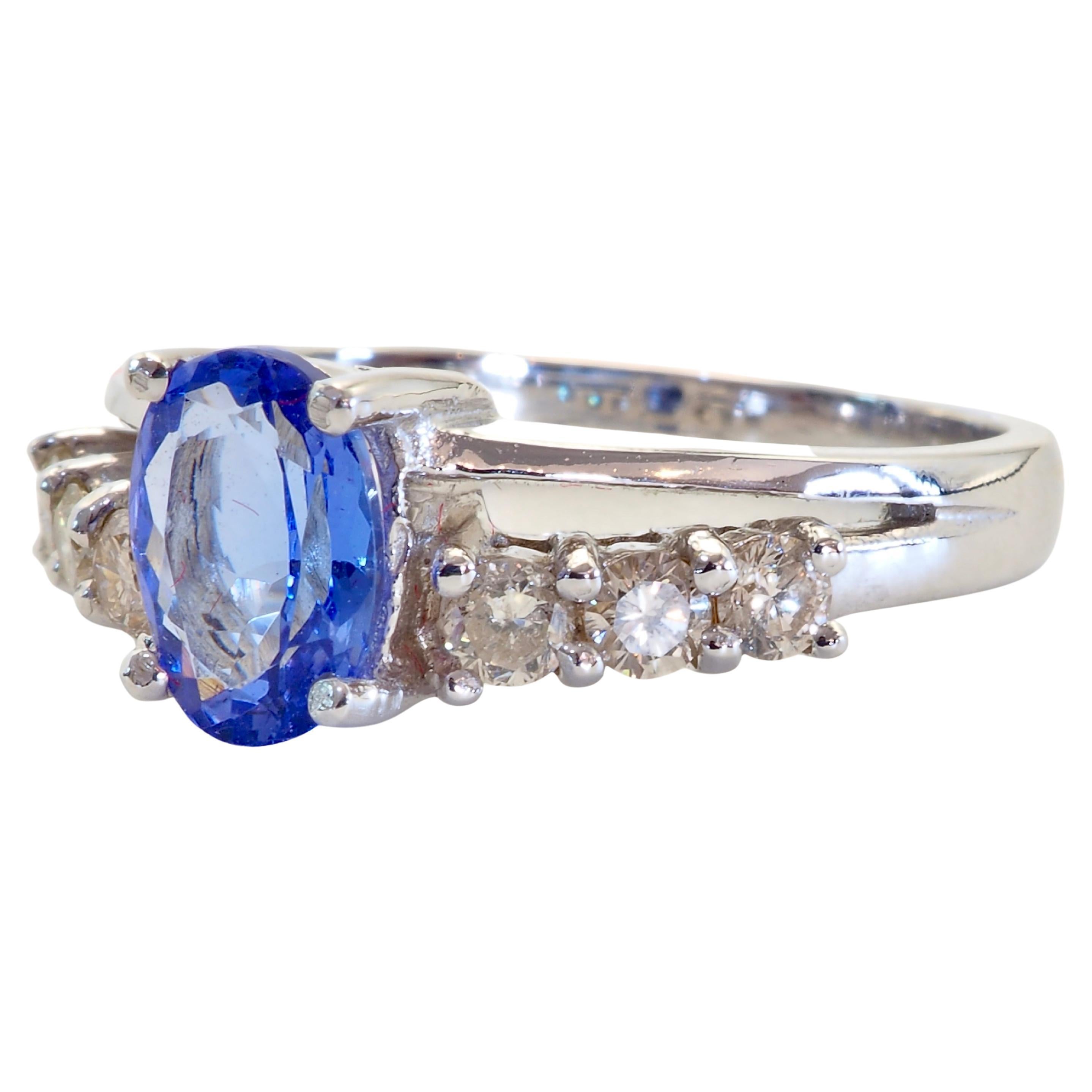 A wonderful ring equipped with a highly bright oval tanzanite with 6 brilliant diamonds of decent size and grade. December birthstone but will look good on anyone's fingers.

Product Details:

Metal: 18k Solid Gold
Metal Color: White Gold
Tanzanite: