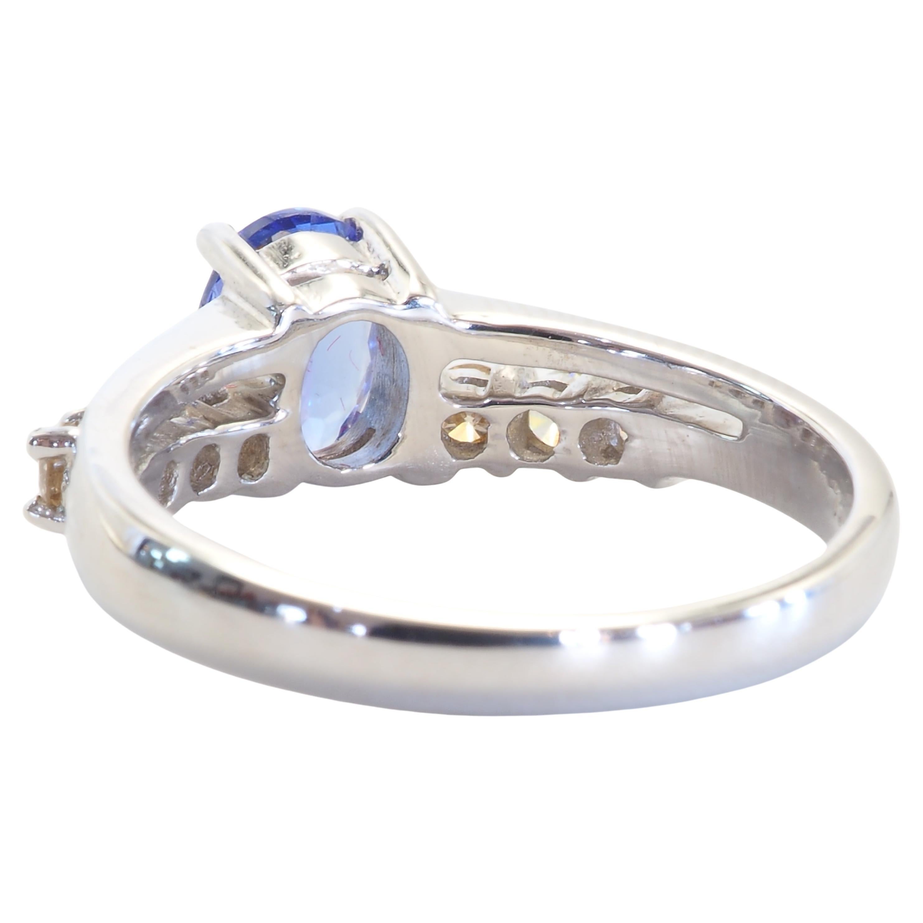 Oval Cut 18K White Gold 0.95ct Violet Blue Tanzanite & 0.34ct Brilliant Diamond Fine Ring For Sale