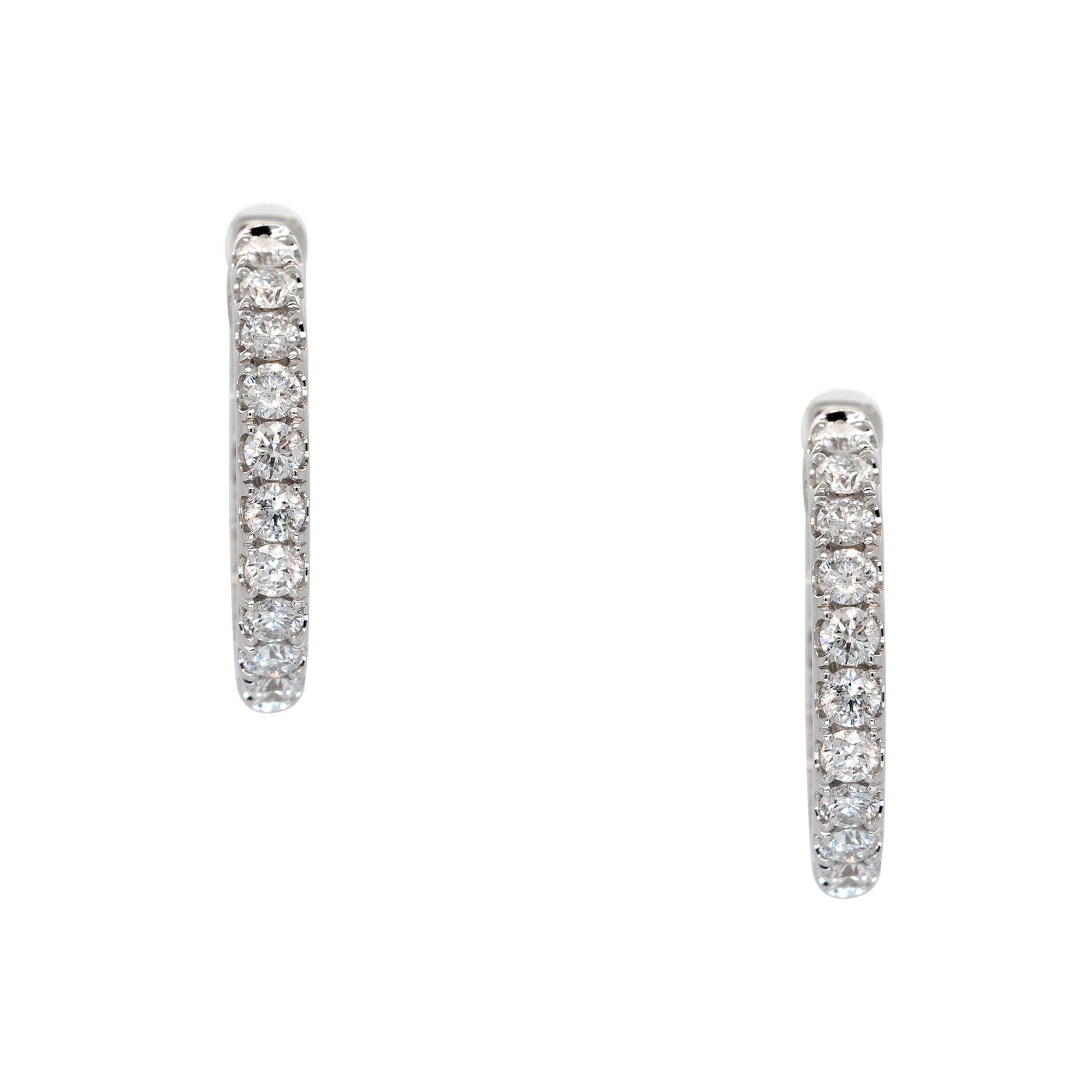 Material: 18k White Gold
Diamonds Details: 
0.99ct Round Brilliant Natural Diamond
G Color VS Clarity
Measurements: 55.88mm x 2.5mm x 2.2mm
Closure: Post Snaps
Total Weight: 5.5g (3.6dwt)
This item comes with a presentation box!
SKU: A30317328

A