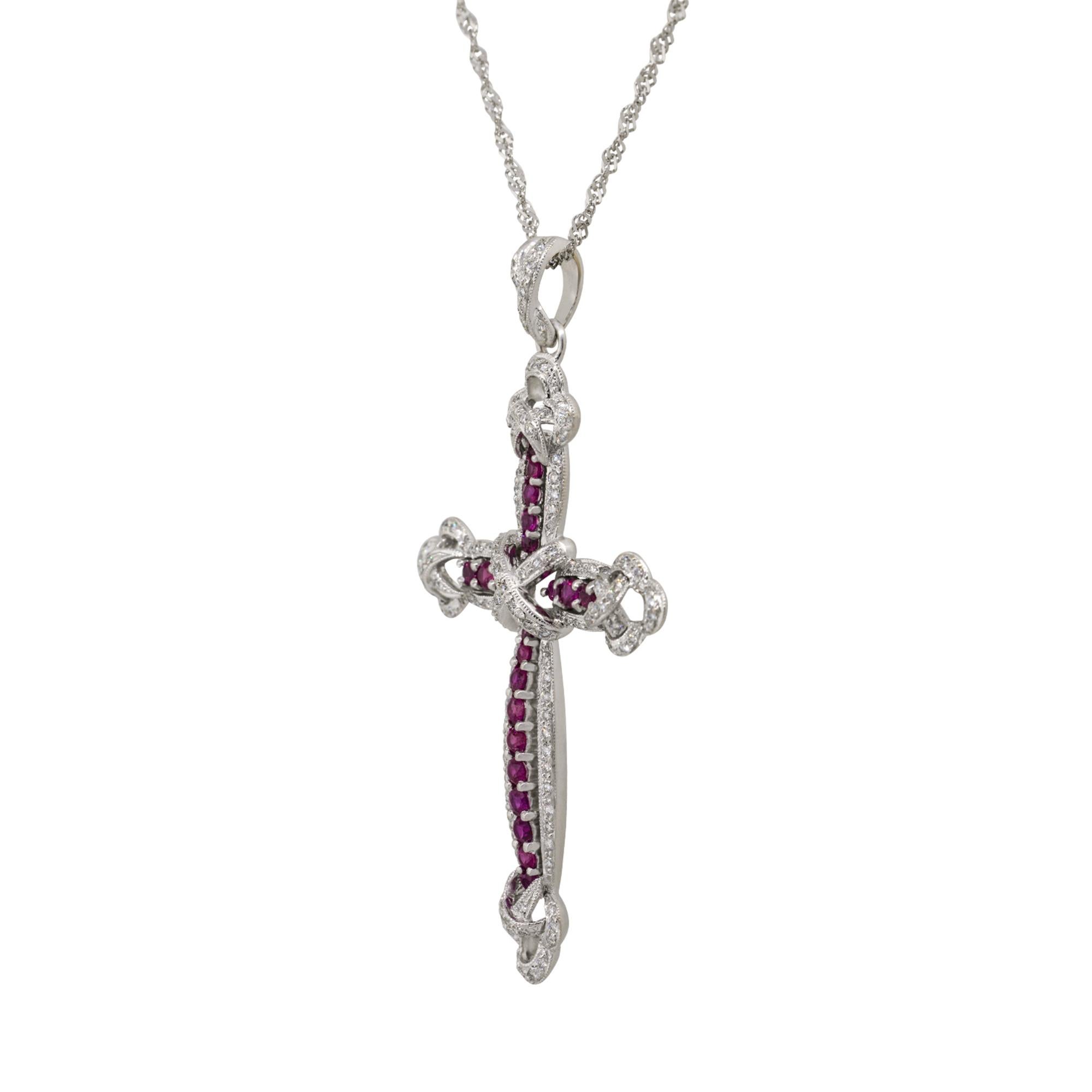 Material: 18k White Gold
Diamond Details: Approx. 0.88ctw of round cut diamonds. Diamonds are G/H in color and VS in clarity
Gemstone Details: Approx. 0.99ctw of round cut Ruby gemstones
Clasps: Lobster clasp
Total Weight: 7.7g (4.9dwt) 
Pendant