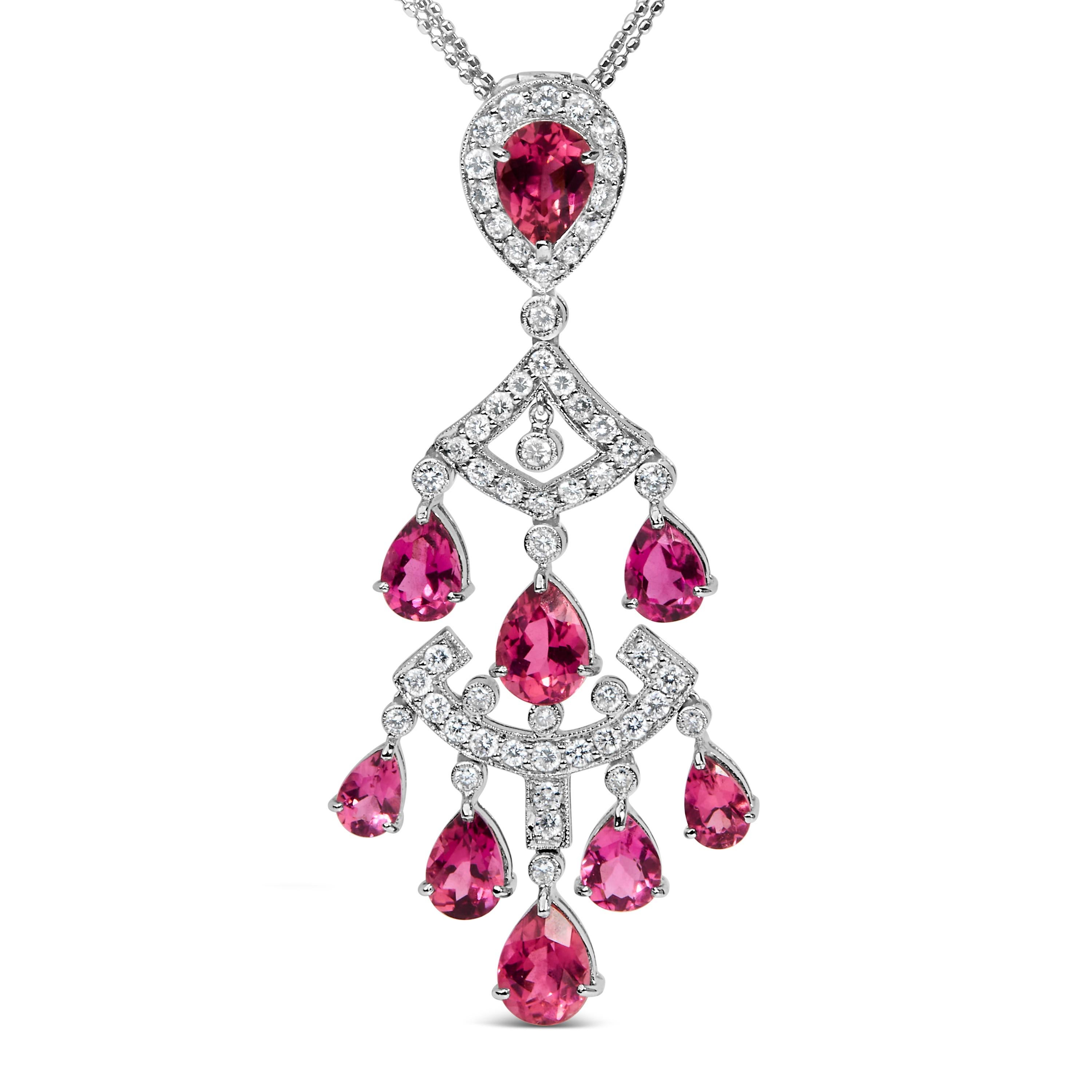 Embrassez une ère de glamour resplendissant avec ce collier pendentif en or blanc 18 carats, exquisément orné d'éblouissants diamants naturels de couleur F-G et de pureté VVS2-VS1, totalisant 1,10 carats, et de somptueuses tourmalines roses taillées