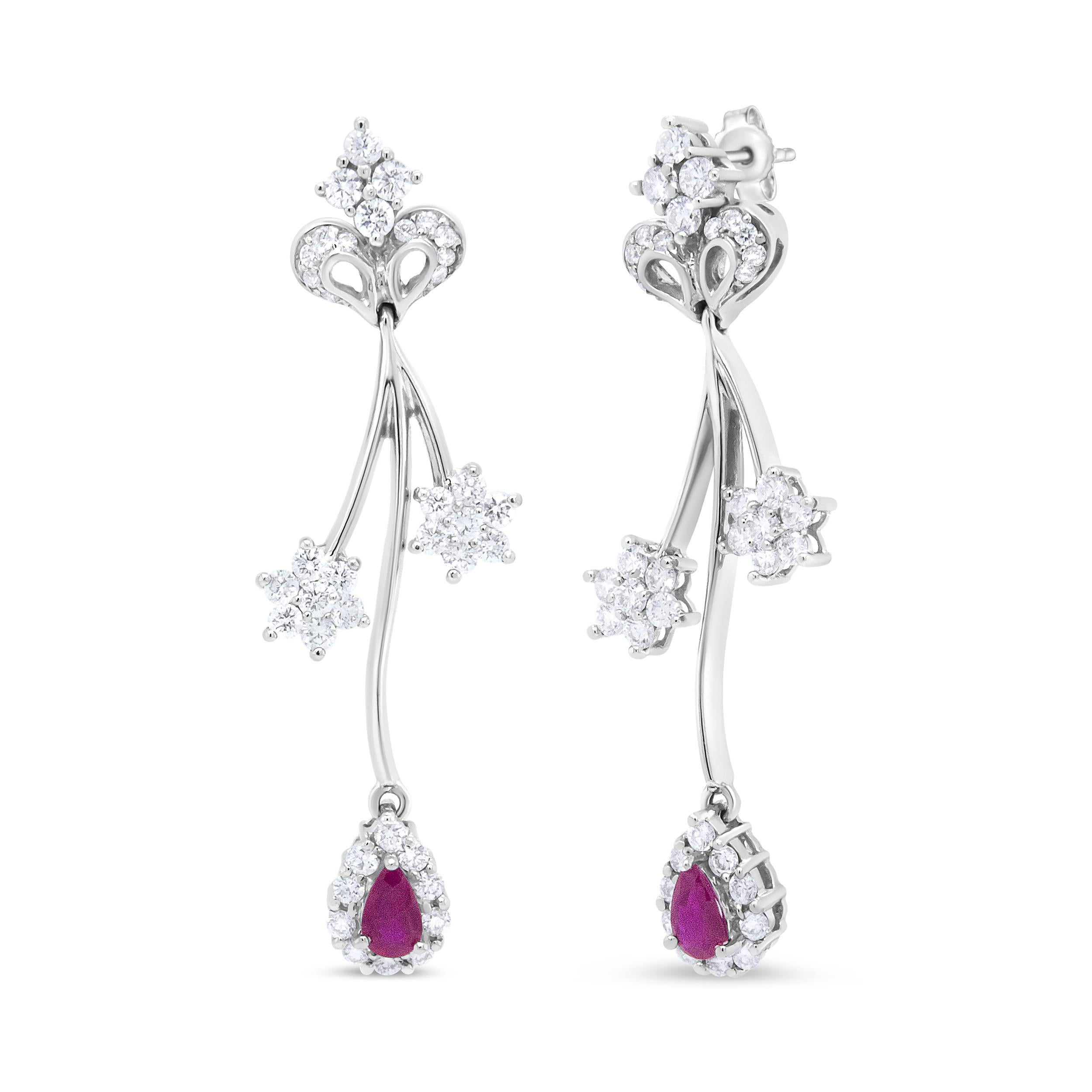 Express your individuality in this pair of 18k white gold freeform dangle drop earrings. The unique shape of these earrings features four prong-set diamonds that form a marquise-shaped 