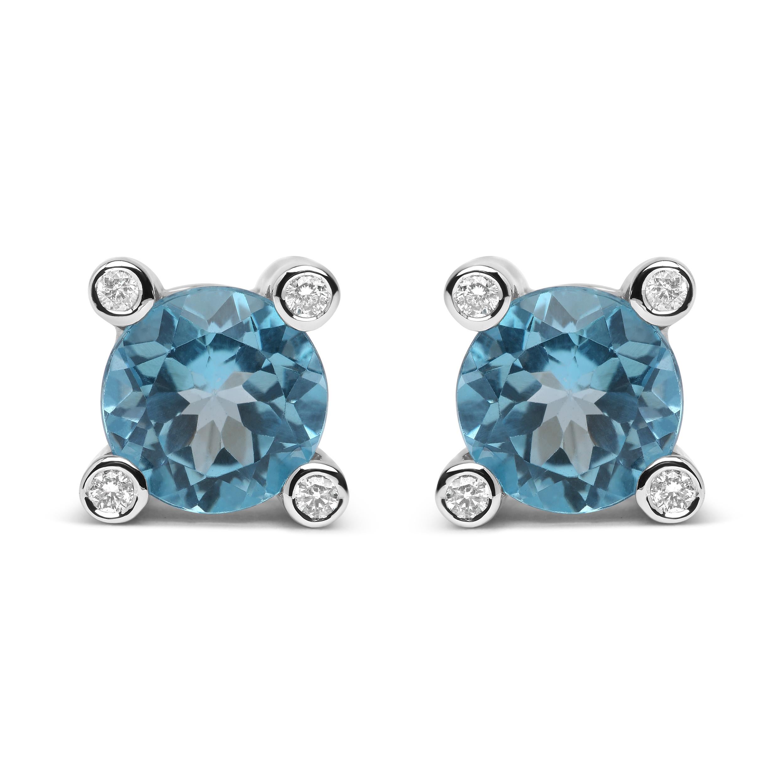 Let your colors shine through with this sweet and sparkly pair of 18k white gold stud earrings. As the centerpiece of this pair, each earring is in possession of a 10x10mm round heat-treated sky blue topaz gemstone in a prong setting. The prong