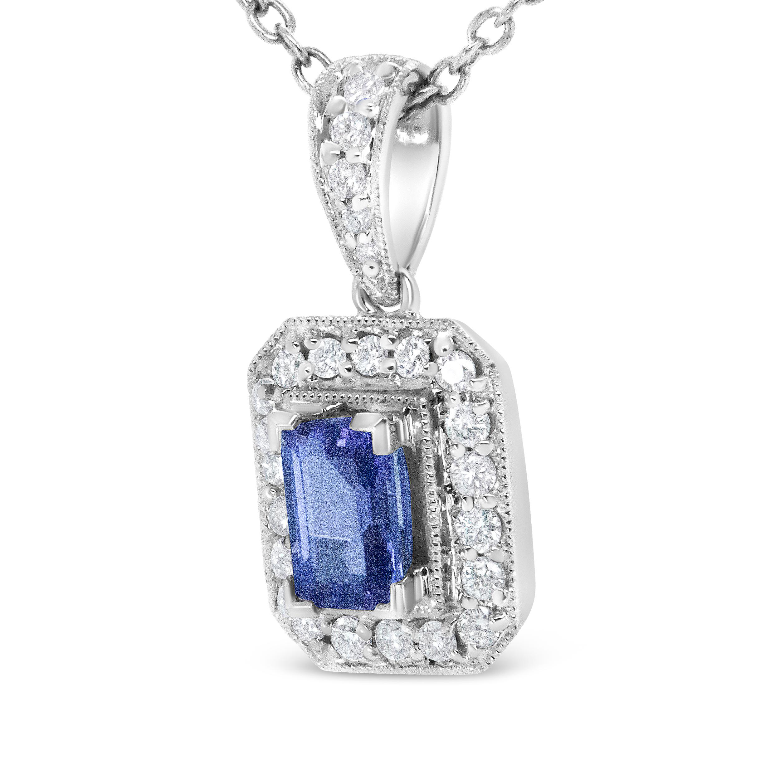A shimmering 6x4mm emerald-cut purple tanzanite gemstone is surrounded by sparkling round diamonds in pave settings to create this elegant pendant necklace. These glorious white diamonds are set in a halo around the centerpiece gem as well as along