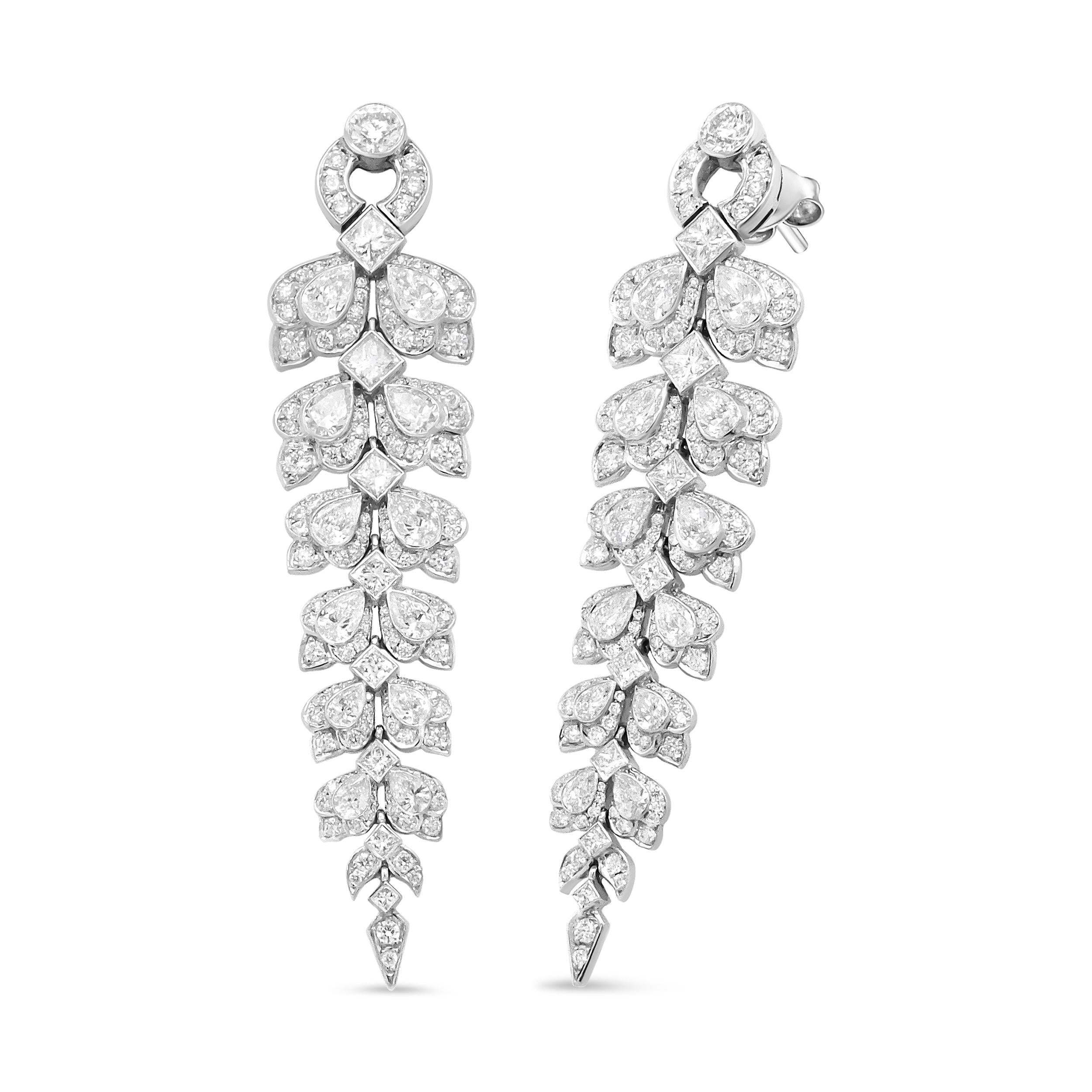 Drape your ears in the exquisite sparkle of 160 diamonds that cascade in an elegantly dramatic 2.5 inch drop. Indulge your collection and add luxurious drama to any ensemble with this sensational pair that transcends style in regal elegance. The