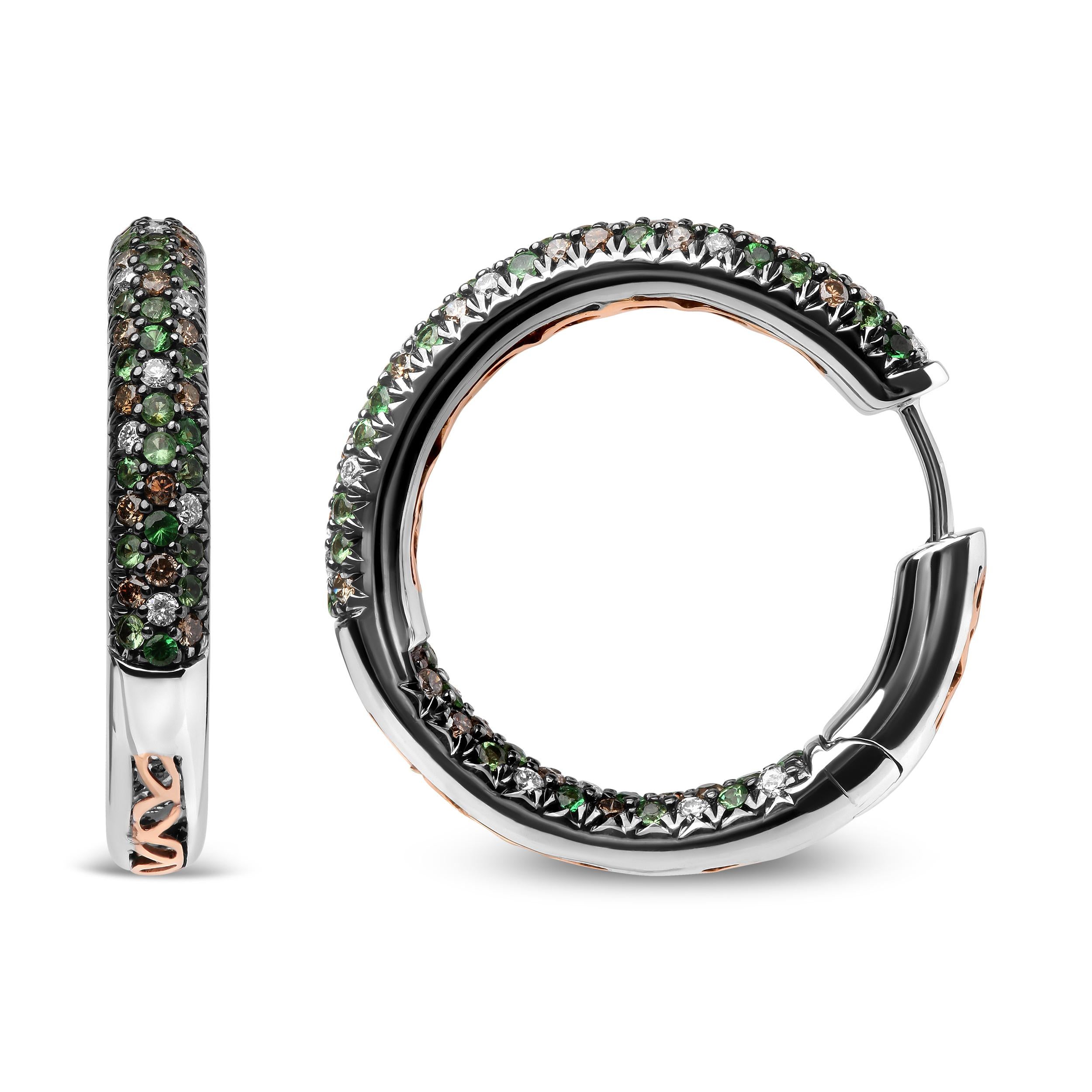 The glamorous inside-outside design of these 18k white gold hoops makes the natural gemstones and diamonds sparkle at every angle. This upscale pair sizzles in a design of 1.3mm round heat-treated green tsavorite gemstone blended with brown and