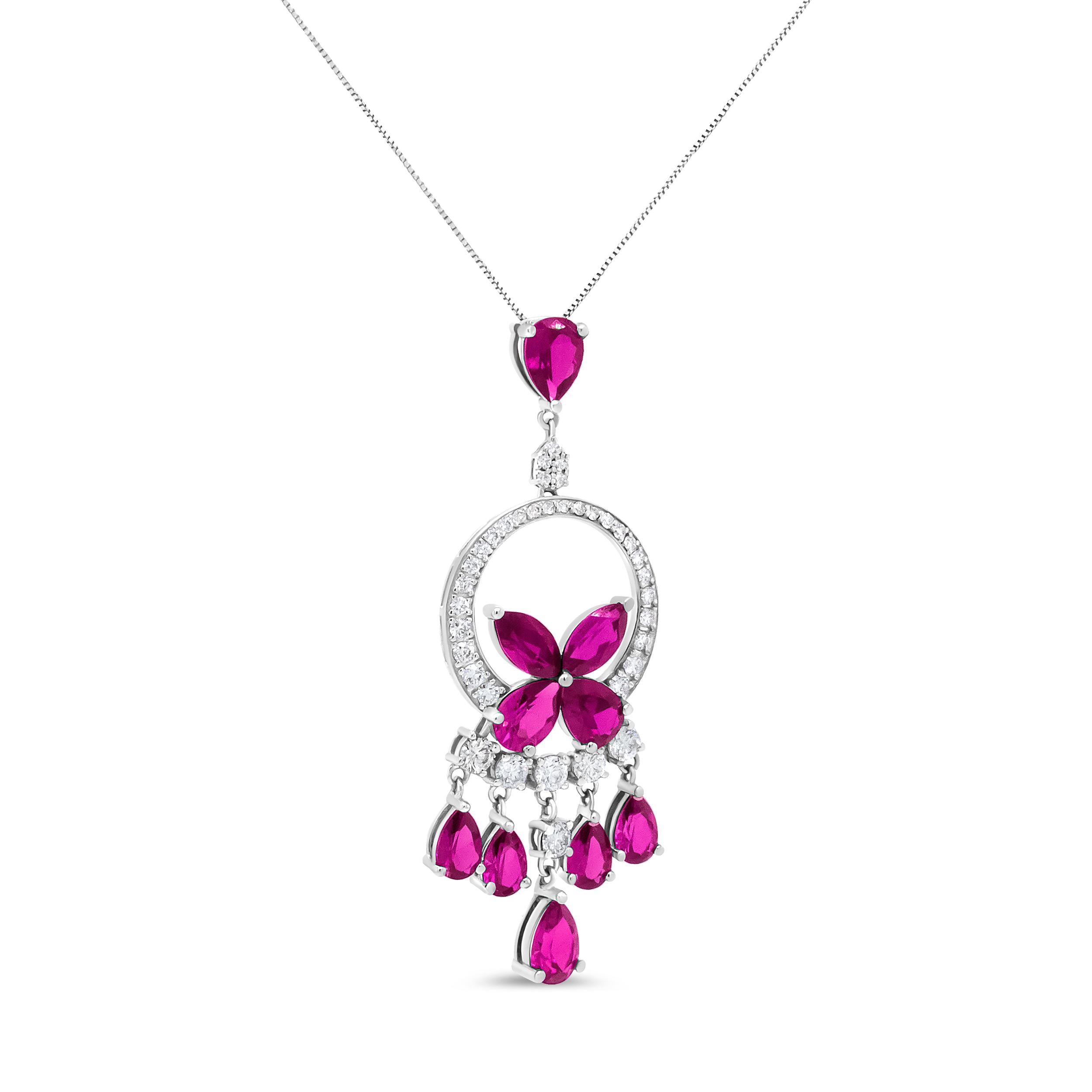The glory of diamonds and gemstones emit a harmonious dose of sparkle in this gorgeous pendant necklace crafted from genuine 18k white gold. Round, white diamonds nestled in prong settings enthrall with their gleaming beauty in a total 1.00 cttw