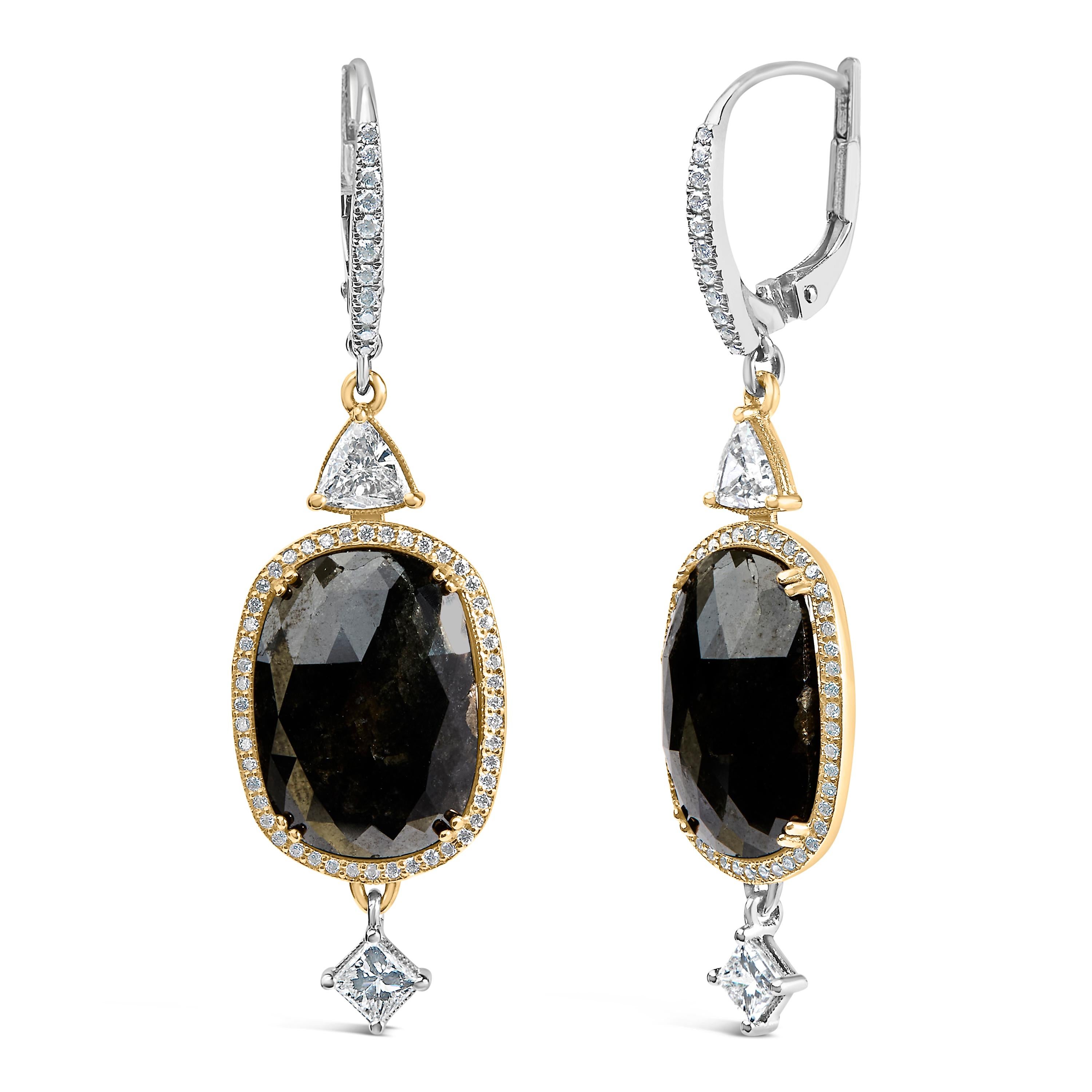 Enthüllen Sie zeitlose Eleganz mit diesen Ohrringen im Vintage-Stil, die meisterhaft aus rhodiniertem 18-karätigem Weißgold gefertigt sind. Jedes Stück besticht durch einen 6x9 mm großen, natürlichen schwarzen Onyx, dessen tiefer Farbton die Blicke