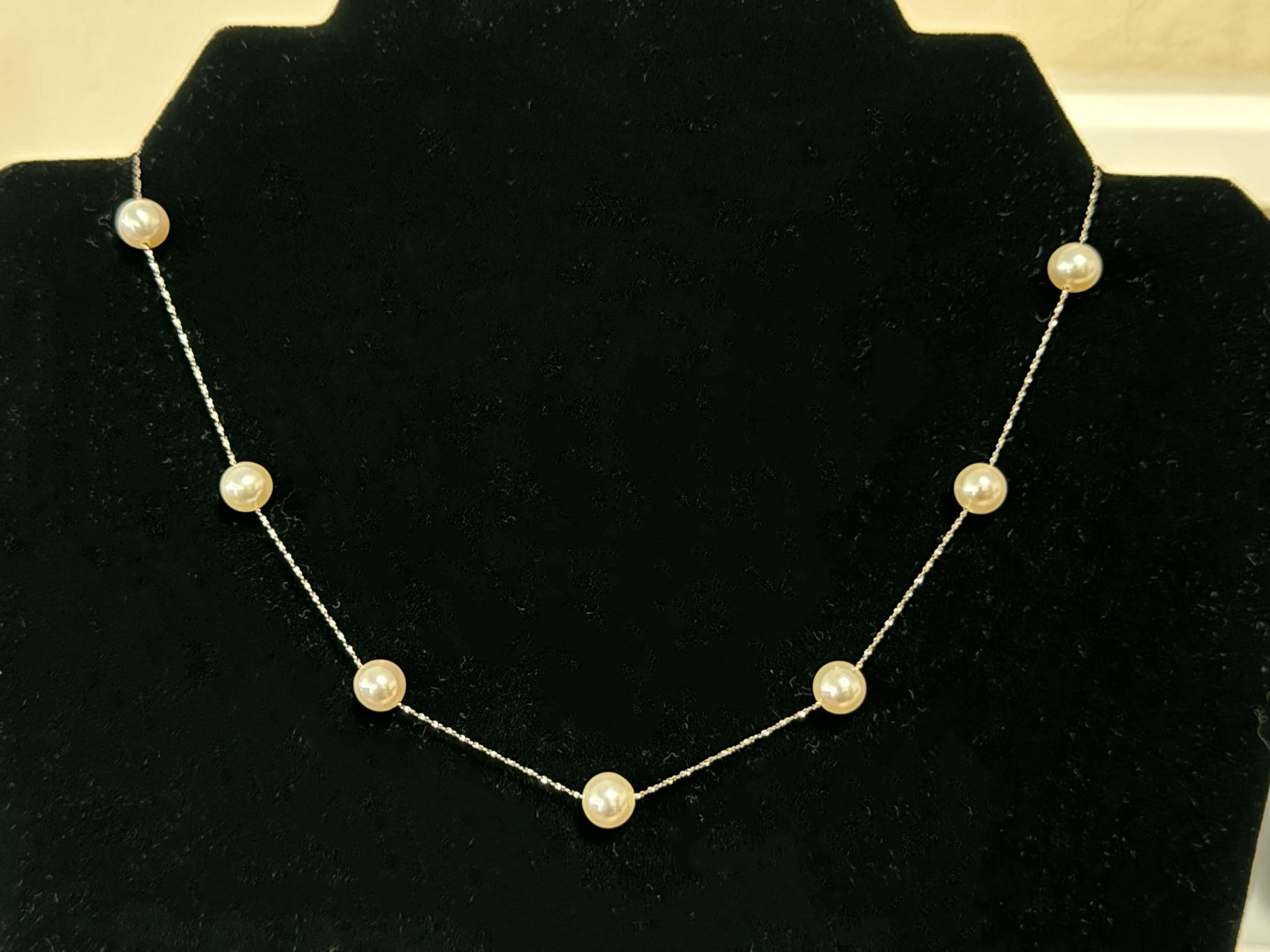Donna Collana a catena con 10 perle in oro bianco 18 carati in vendita