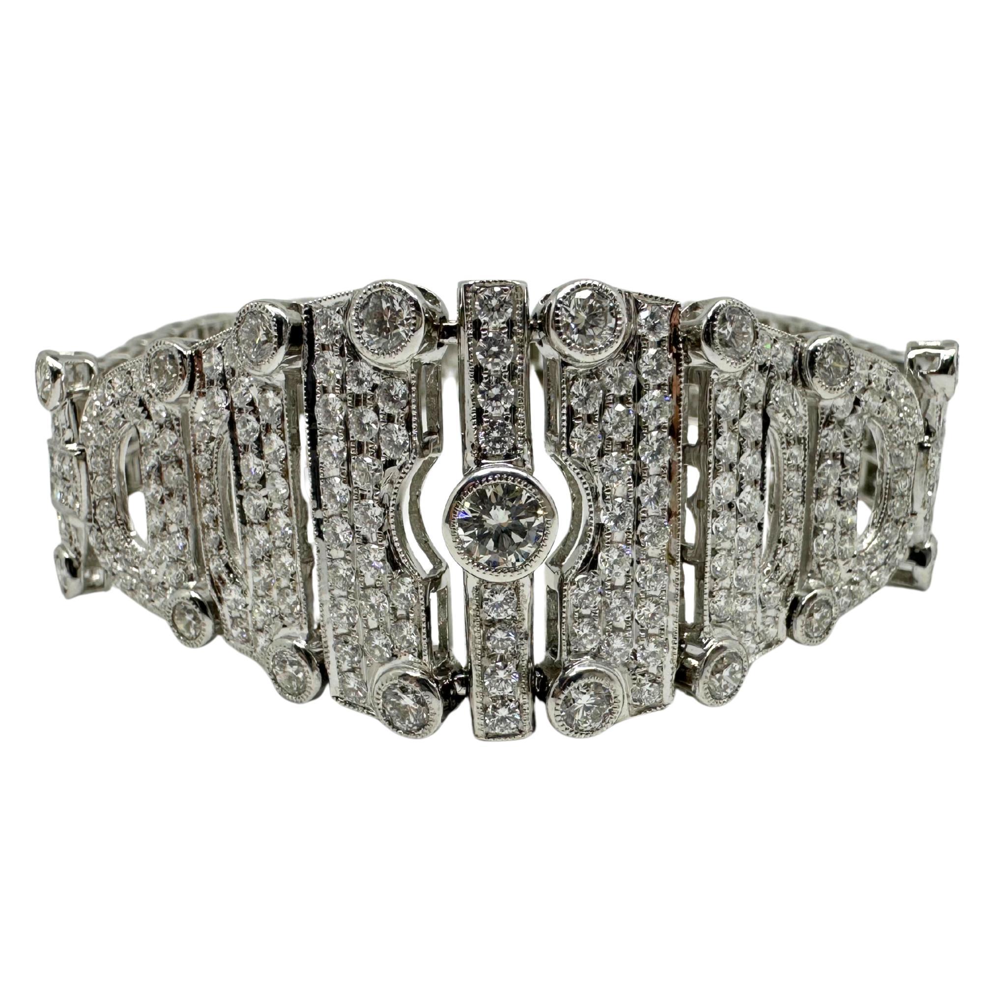 A striking vintage bracelet crafted in 18K white gold, set with 10.13 carats of diamonds. The bracelet has a refined design that tapers elegantly toward the back, giving it both comfort and sophistication.

18K White Gold 10.13 Carat Diamond
