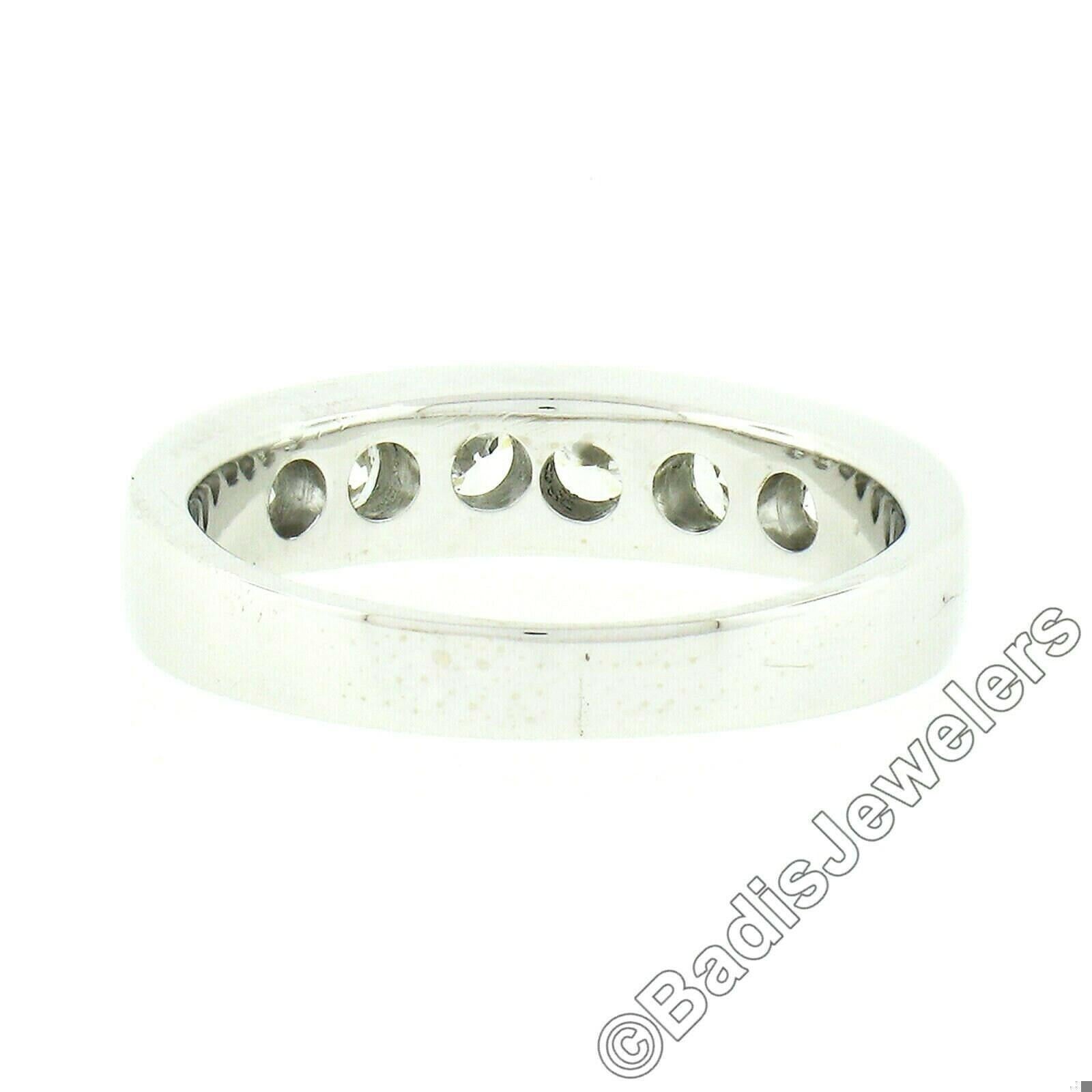 --Stone(s):--
(6) Natural Genuine Diamonds - Round Brilliant Cut - Pave Set - F/G Color - VS1/VS2 Clarity
Total Carat Weight: 1.02 (approx.)

Material: 18k Solid White Gold (tested)
Weight: 4.6 Grams
Ring Size: 5.5 (We can custom size this ring -