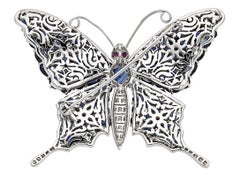 18k White Gold & 10.30ct Sapphire Butterfly Brooch w/ 1.15ct Diamond & Ruby