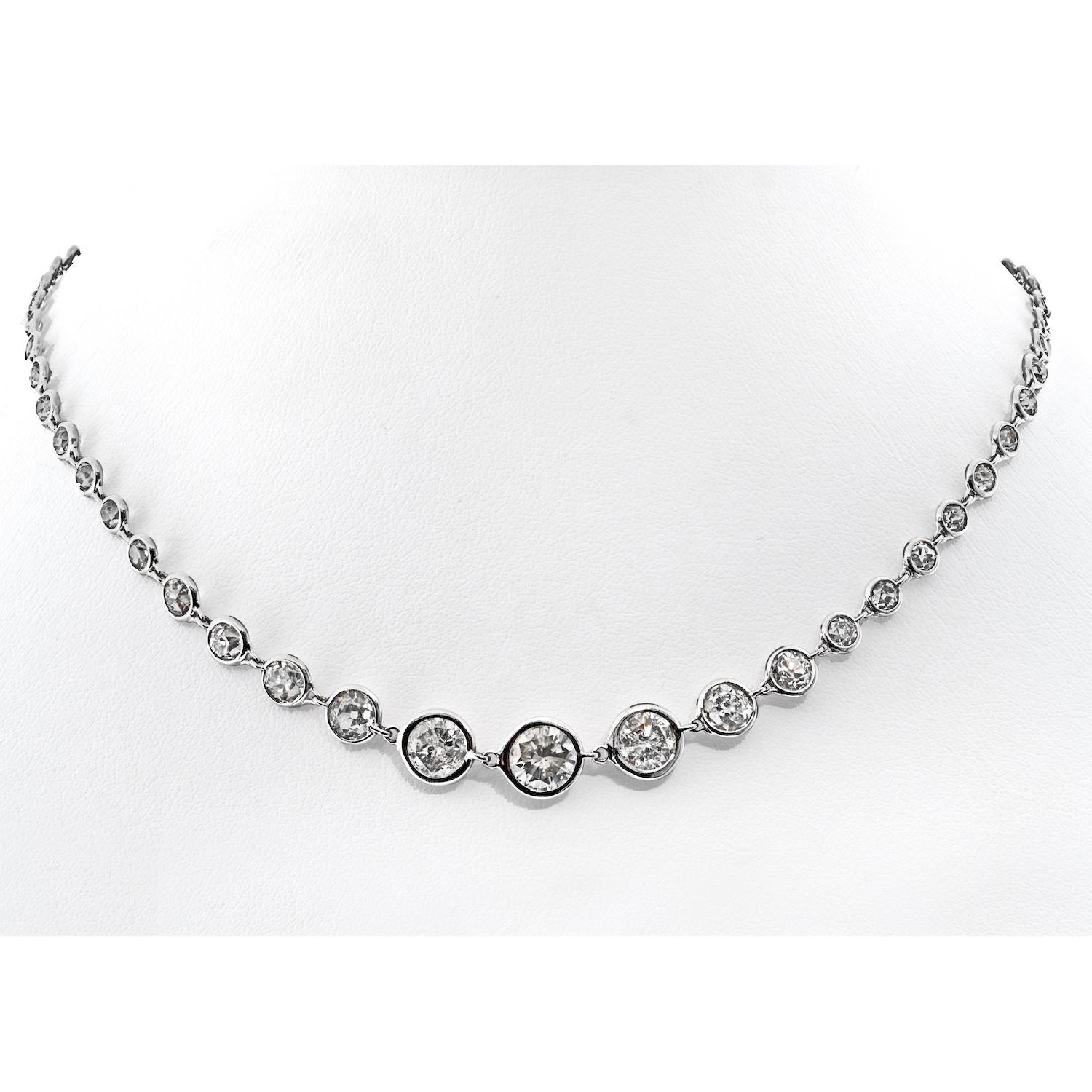 Indulge in the epitome of luxury with this breathtaking 18K White Gold Diamond Choker Necklace, boasting a total diamond weight of 10.58 carats. The diamonds, carefully selected for their quality, exhibit a captivating brilliance and fire, with a