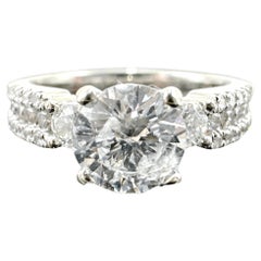Anillo de compromiso de oro blanco de 18 quilates con diamante brillante redondo natural central de 1,10 quilates