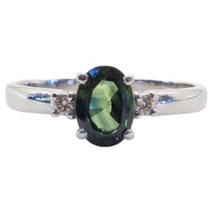 18 Karat Weißgold 1,10 Karat ovaler grüner Saphir & 0,06 Karat Diamant Feiner Ring