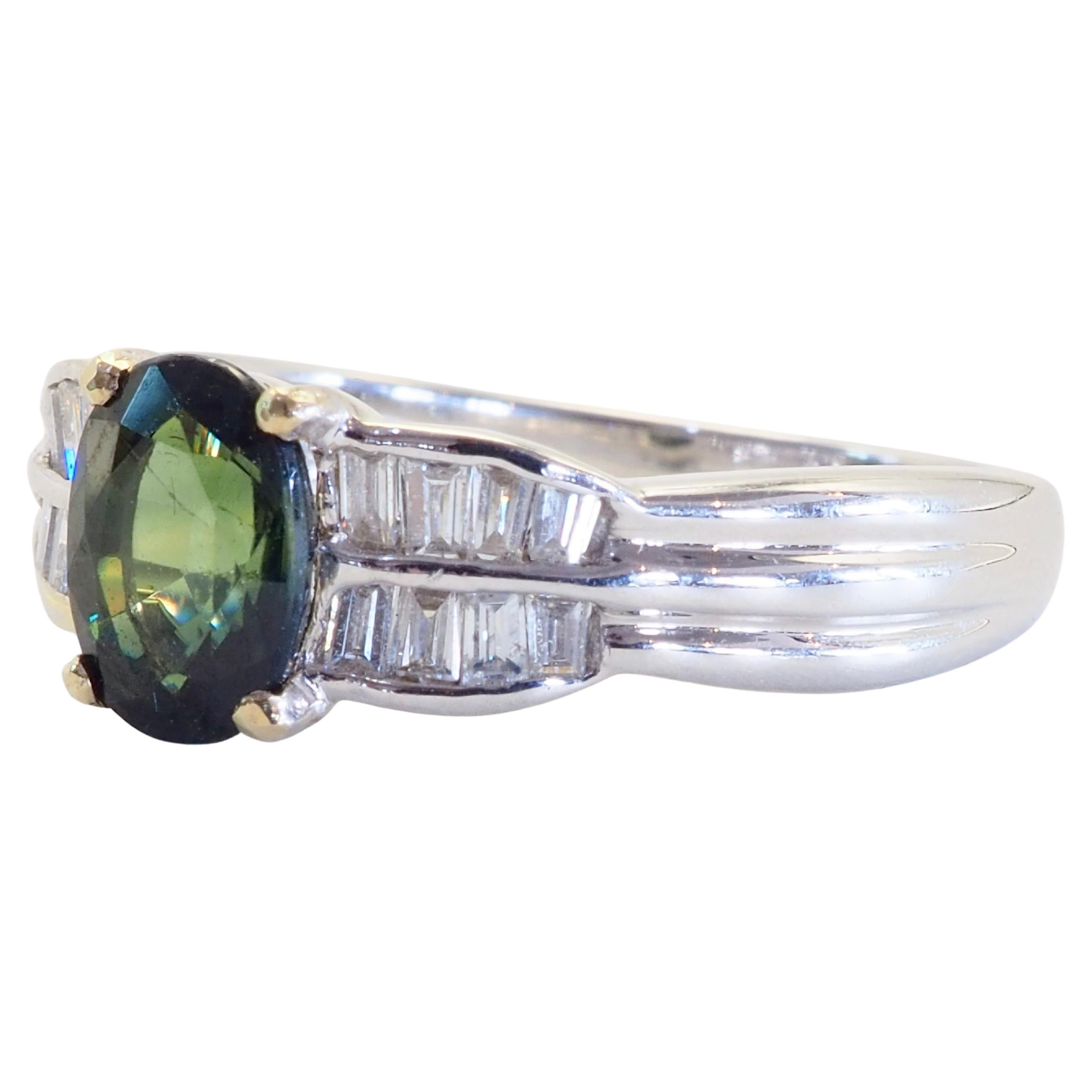 Elegant and sophisticated Thai green sapphire ring of impeccable quality equipped with numerous good grade baguette cut diamonds inlaid neatly. Suitable for wearing at special occasions as well as every day.

Product Details:

Metal: 18k Solid