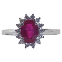 18K White Gold 1.10ct Oval Ruby & 0.20ct Diamond Sunburst Engagement Ring