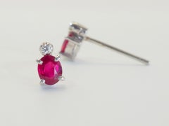 18K White Gold 1.10ct Vivid Red Oval Ruby & 0.02ct Diamond Stud Earrings