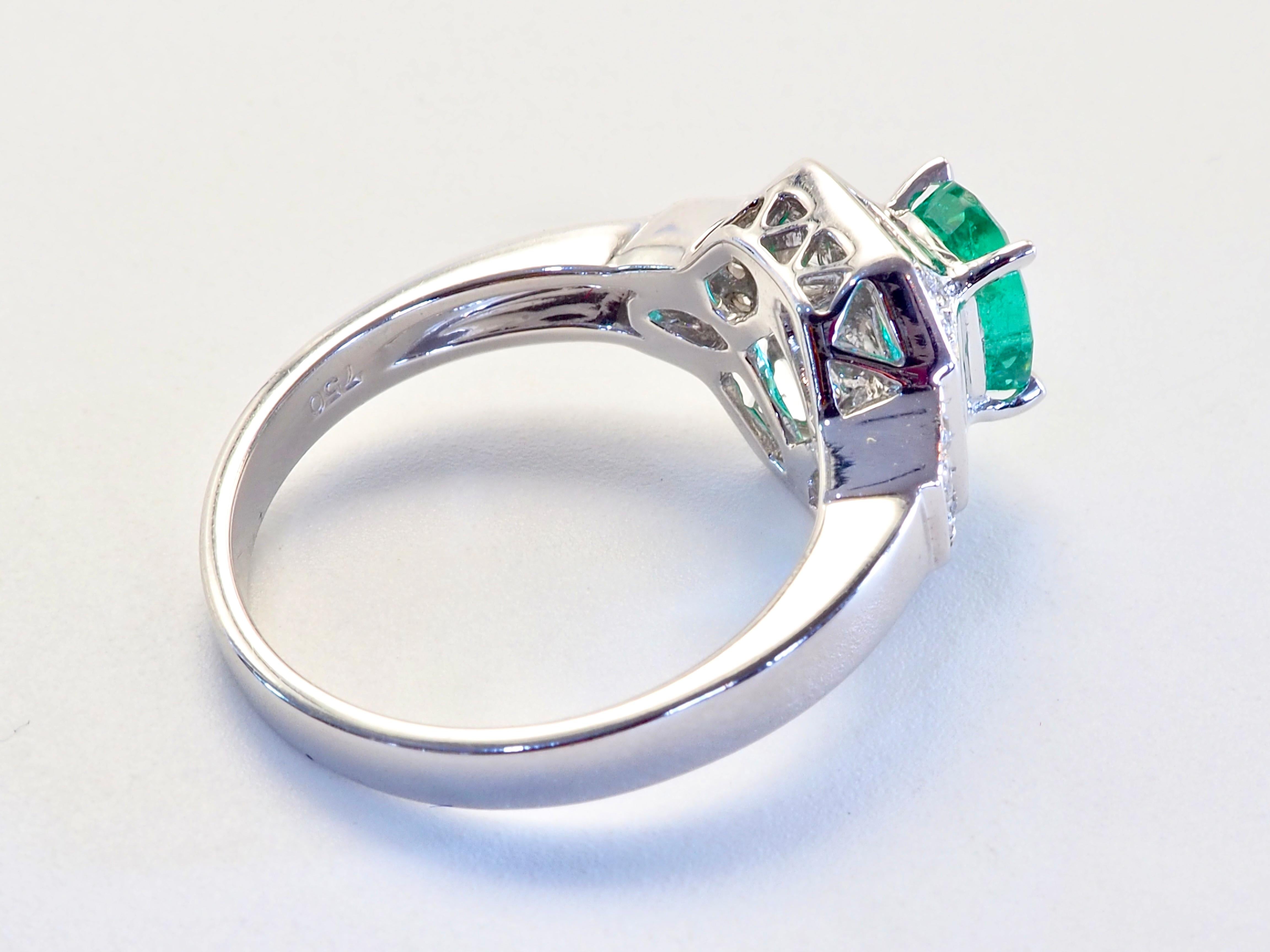 De las mujeres Anillo fino de oro blanco de 18 quilates con esmeralda ovalada de 1,12 ct y diamante de 0,35 ct en venta