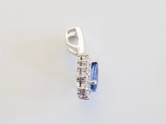 18K White Gold 1.18ct Pear Cut Royal Blue Sapphire & 0.55ct Diamond Halo Pendant