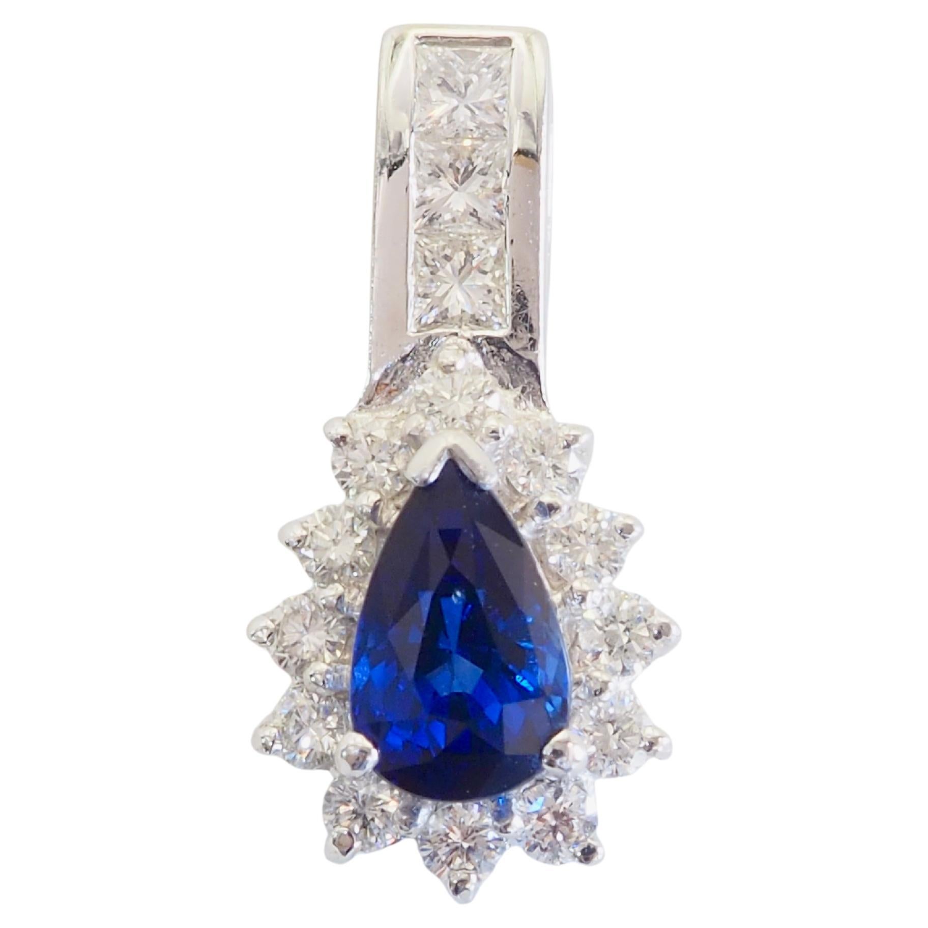 18K White Gold 1.18ct Pear Cut Royal Blue Sapphire 
0.55ct Diamond Halo Pendant For Sale