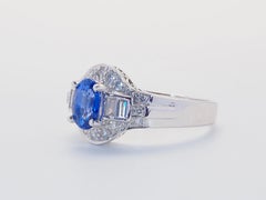 Anello in oro bianco 18 carati con zaffiro blu fiordaliso da 1,20 carati e diamante da 0,40 carati