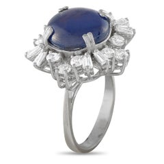 Bague « halo » en or blanc 18 carats, avec diamant de 1,20 ct et saphir en cabochon – MF27-062426