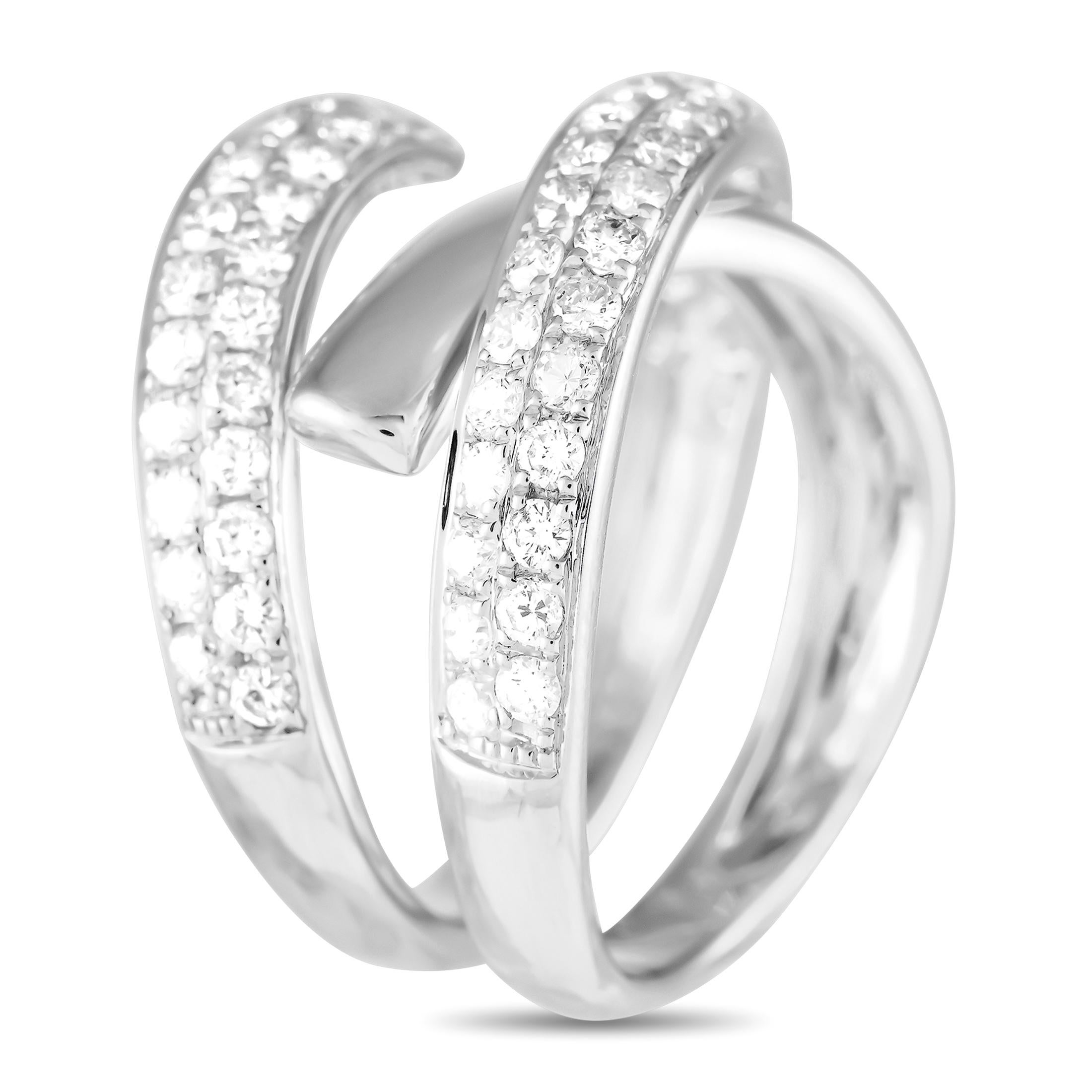 Here is a ring that looks classic yet feels out of the ordinary. It features a polished coiled band in 18K white gold, detailed with double rows of pave diamonds. This spiraling ring wont clash with whatever youre wearing, yet it allows you to