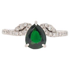 18k White Gold 1.20ct Emerald Gemstone and 0.25ct Round Brilliant Diamond Ring