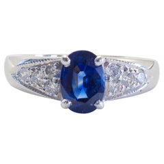 Bague fine en or blanc 18 carats avec saphir bleu de 1,21 carat et diamant de 0,20 carat