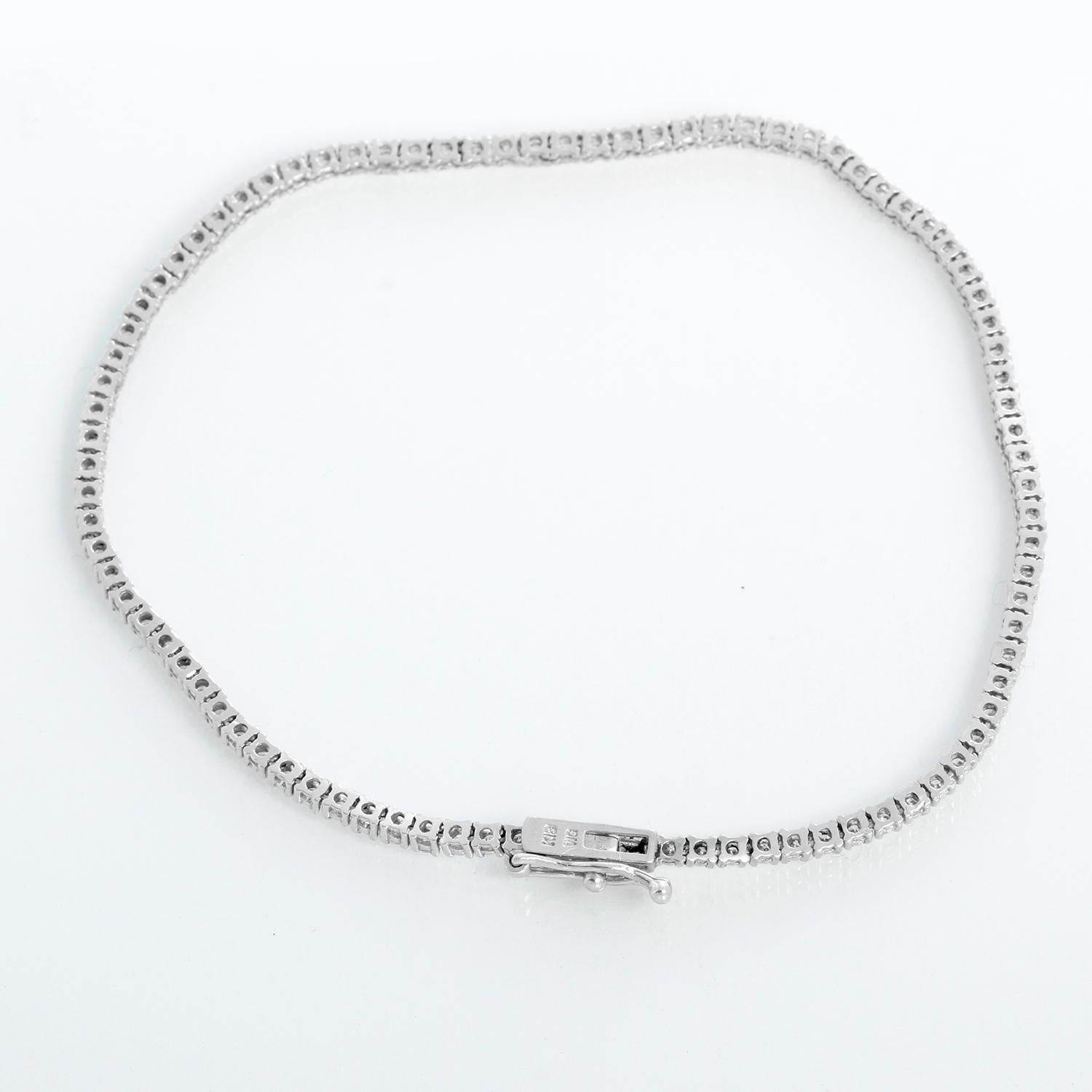 18k White Gold 1.25 ct. Diamond Tennis Bracelet Size 7  - This stunning tennis bracelet features 1.25 carats of SI2-SI3 clarity and HI-color diamonds set in 18k white gold. Bracelet measures 7  inches in length. .