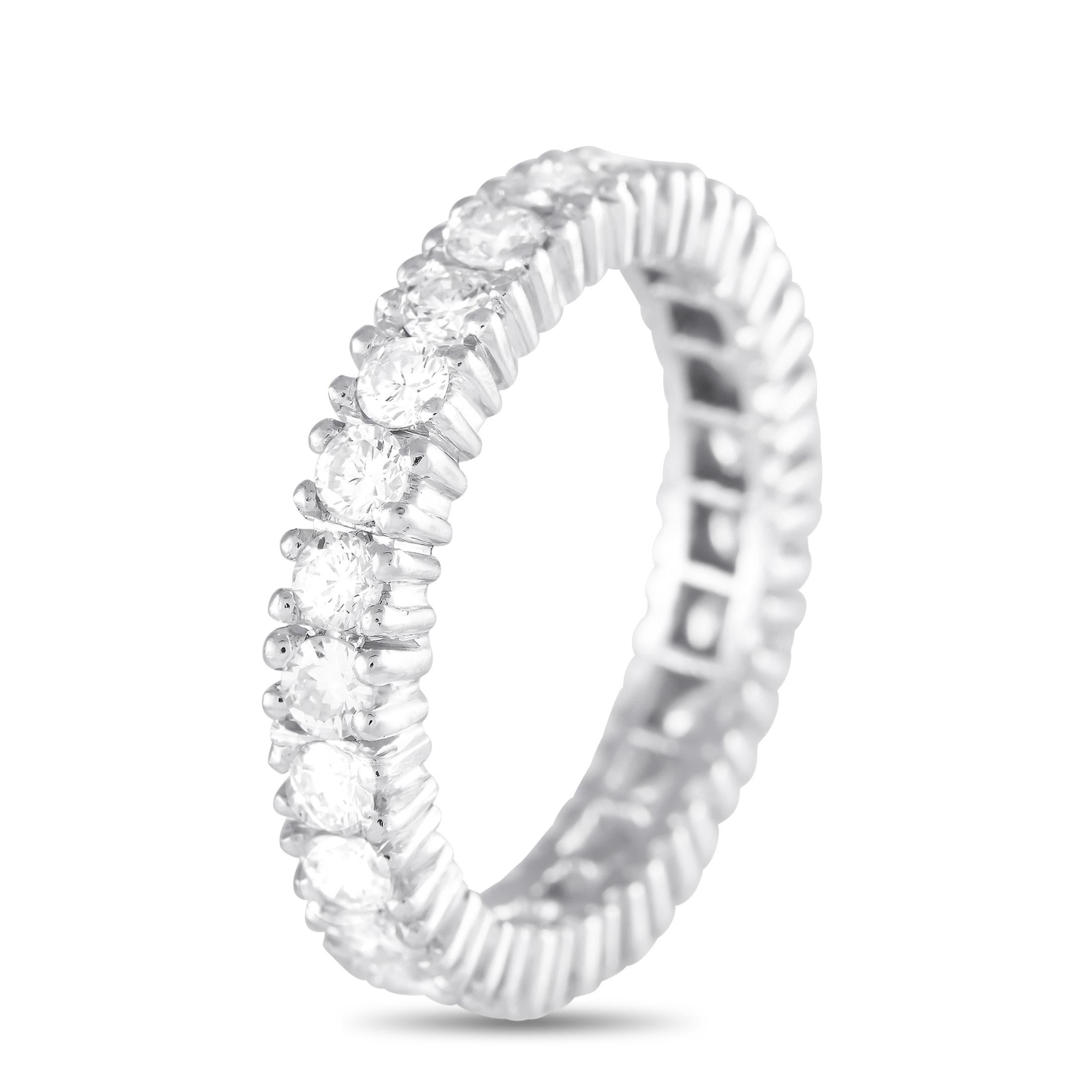 Perfect as an anniversary band or as a wedding band, this eternity ring delivers non-stop sparkle symbolizing everlasting love. It features round brilliant diamonds totaling 1.25 carats lined along the white gold band's entire circumference. The