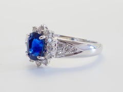 18K White Gold 1.26ct Oval Fiery Blue Sapphire & 0.35ct Diamond Band Ring
