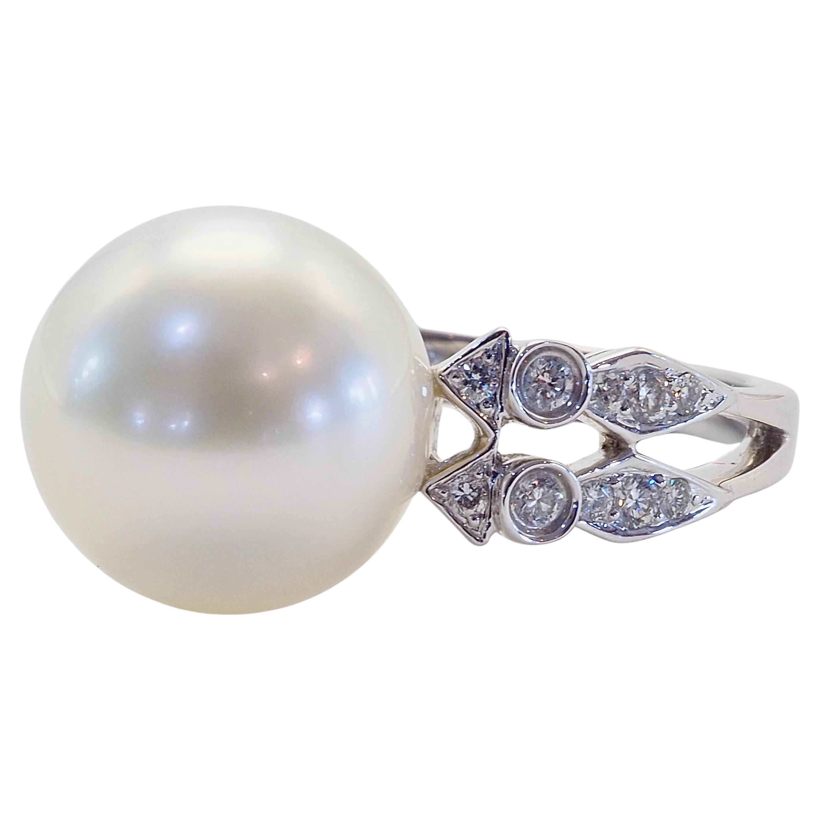White South Sea Pearl though dainty at 12mm diameter is very shiny and clear as can be. The brilliant diamonds follow suit shining brightly together. 
A fine craftsmanship and culmination of everything white and pure.

Thailand has been known to