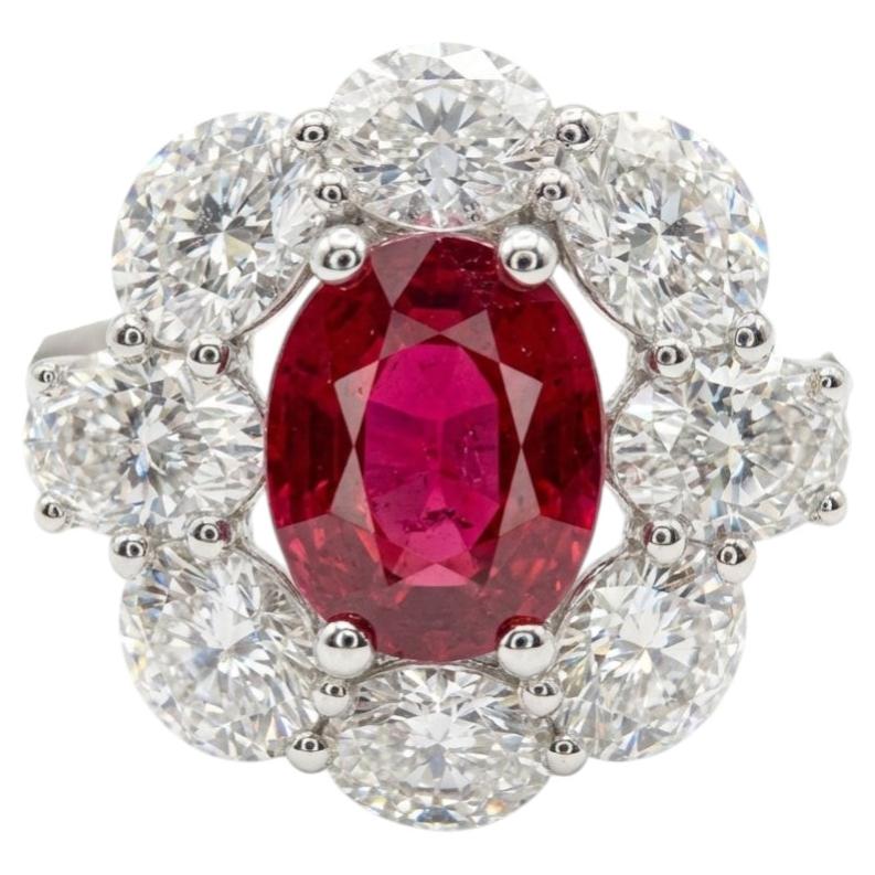 18K White Gold 1.30Ct Oval Ruby and 1.50Ct Diamond Halo Ring
