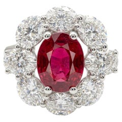 18K White Gold 1.30Ct Oval Ruby and 1.50Ct Diamond Halo Ring