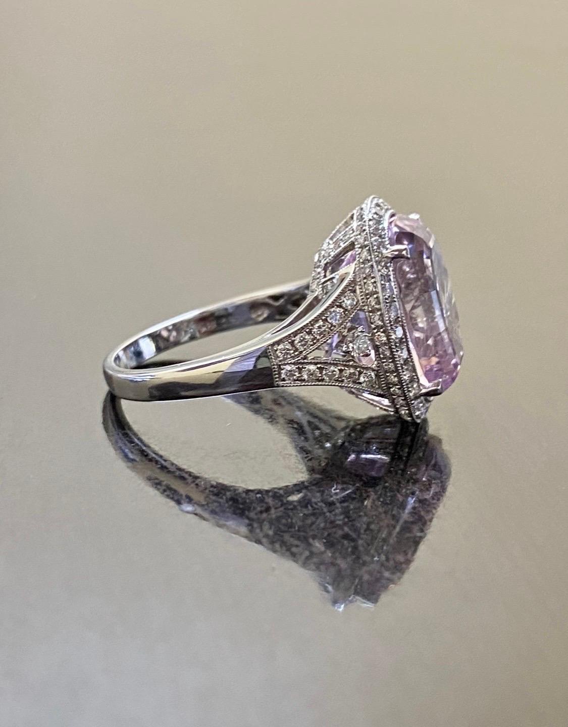 DeKara Designs Collection

Our latest design! An elegant and lustrous Oval Kunzite surrounded by beautiful diamonds in a halo setting.

Metal- 18K White Gold, .750.

Stones- Center Features an Genuine Oval Kunzite, 13.18 Carats, 44 Round Diamonds,