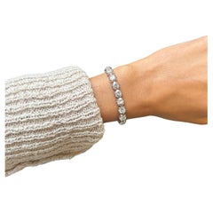 Bracciale tennis con diamanti rotondi Issac Nussbaum in oro bianco 18 carati (13,26 carati)